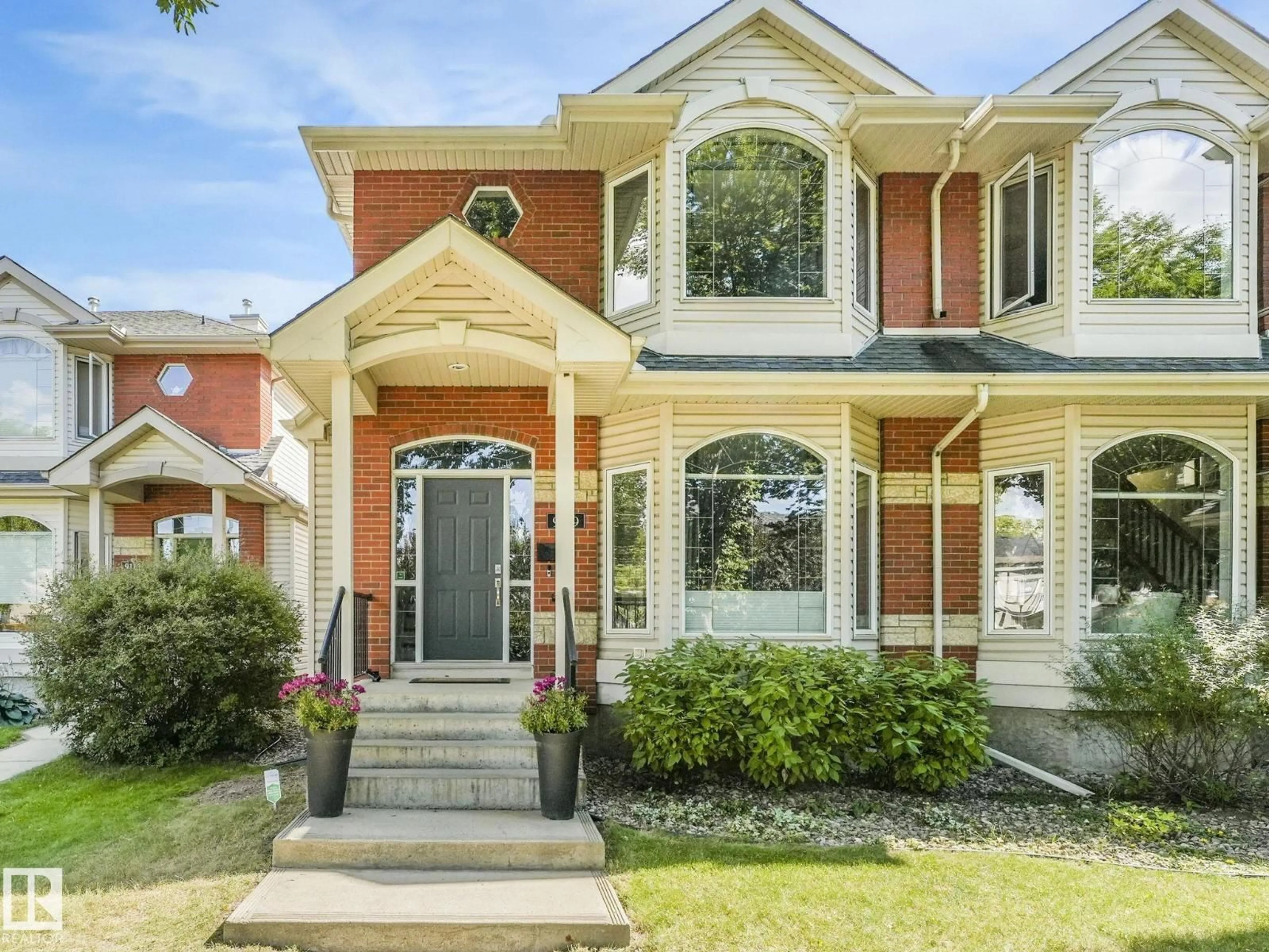 Home with brick exterior material, street for 9119 101 AV, Edmonton Alberta T5H4P1