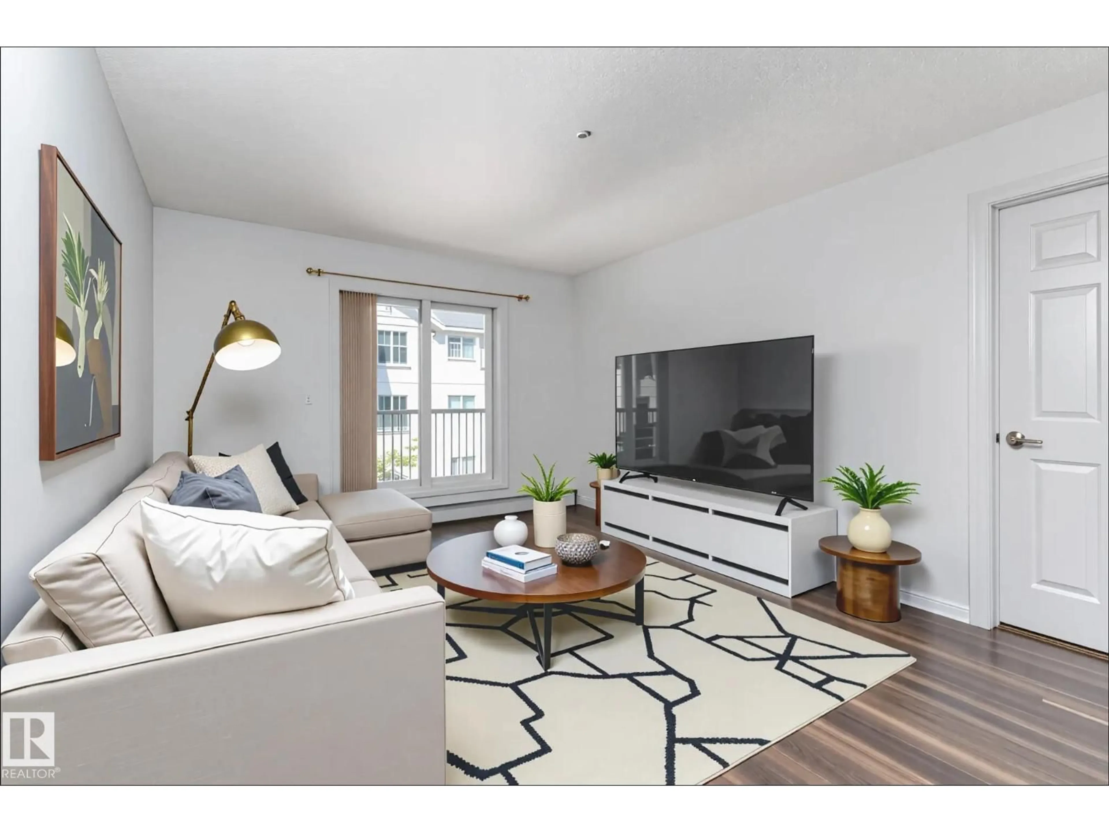 Living room with furniture, wood/laminate floor for 303 - 2208 44 AV NW, Edmonton Alberta T6T0G6