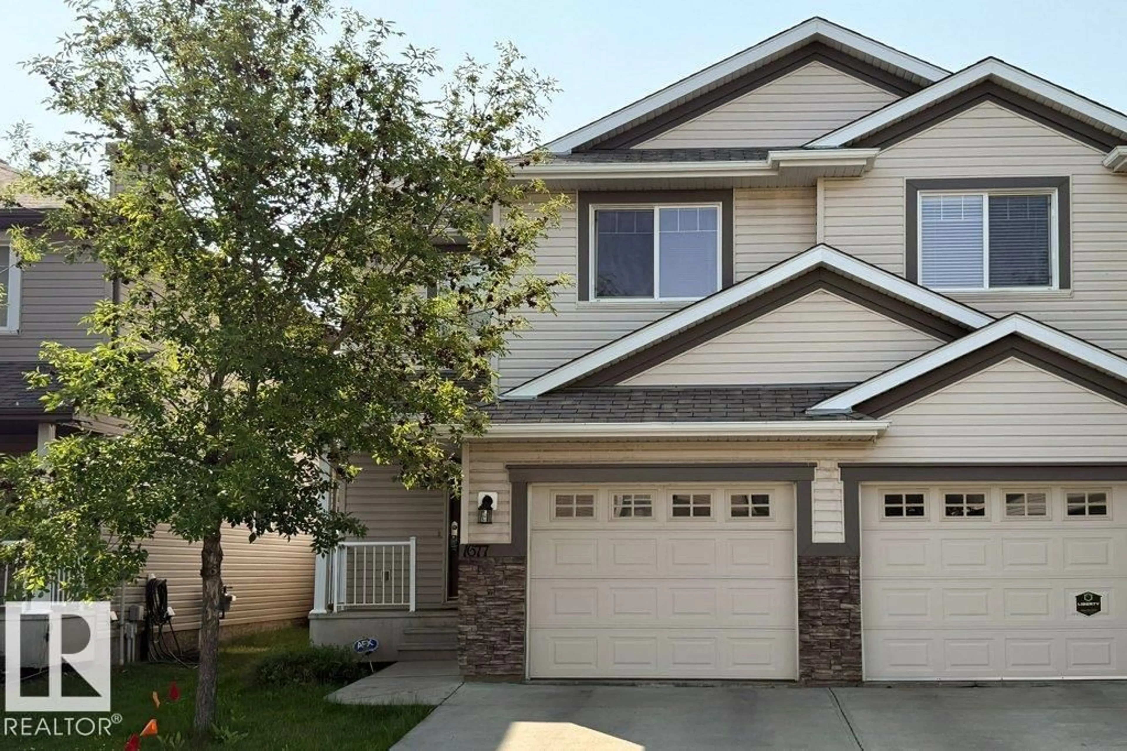 Home with vinyl exterior material, street for 1677 MELROSE PLACE SW, Edmonton Alberta T6X1X6