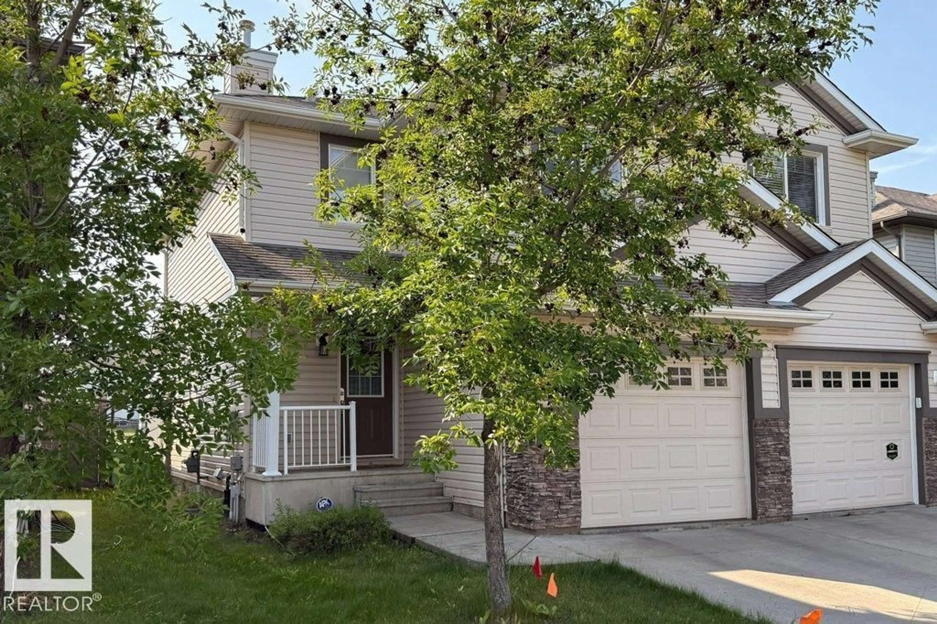 Home with vinyl exterior material, street for 1677 MELROSE PLACE SW, Edmonton Alberta T6X1X6