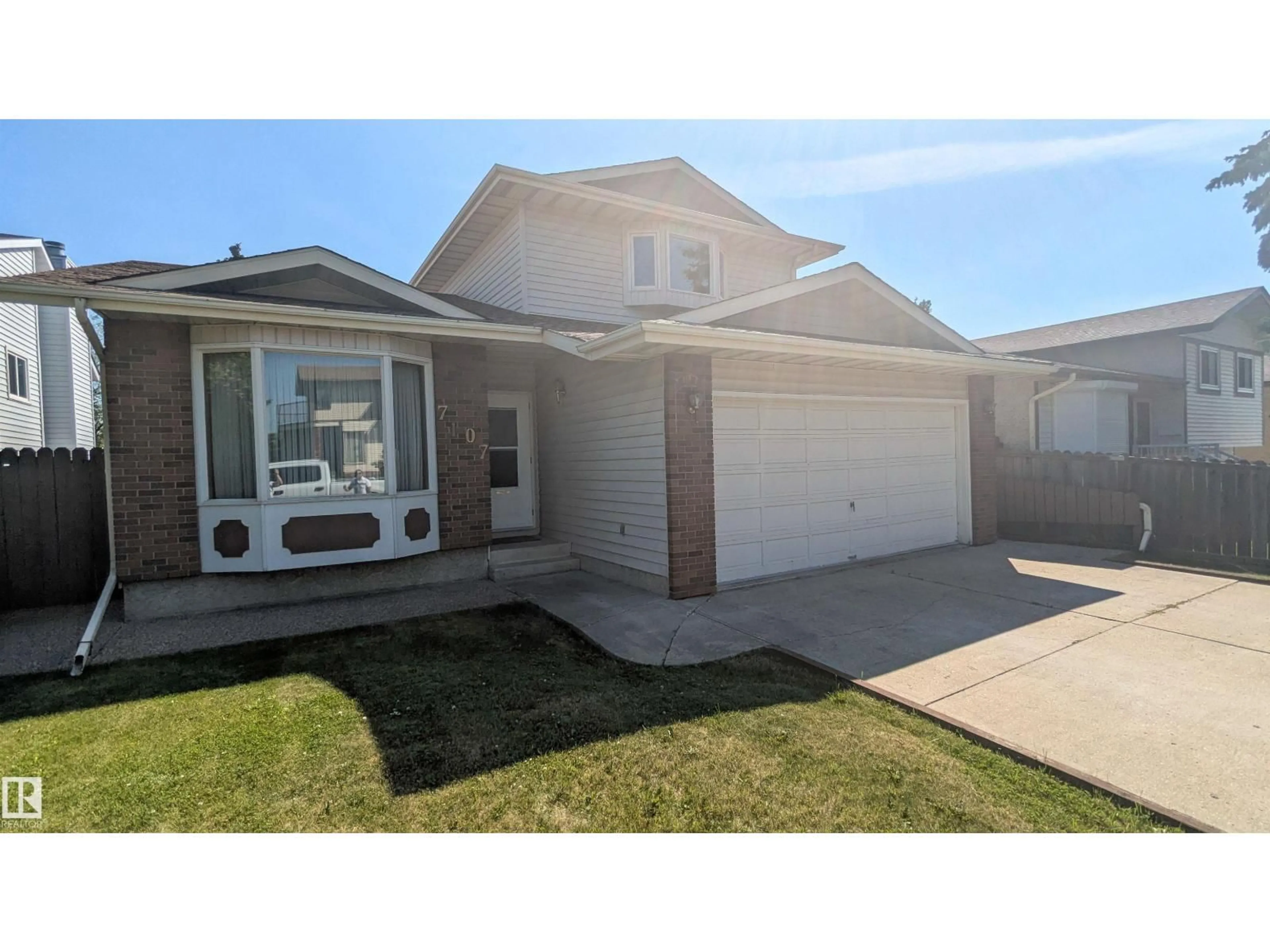 Home with vinyl exterior material, street for NW - 7107 152B AV, Edmonton Alberta T5C3P4
