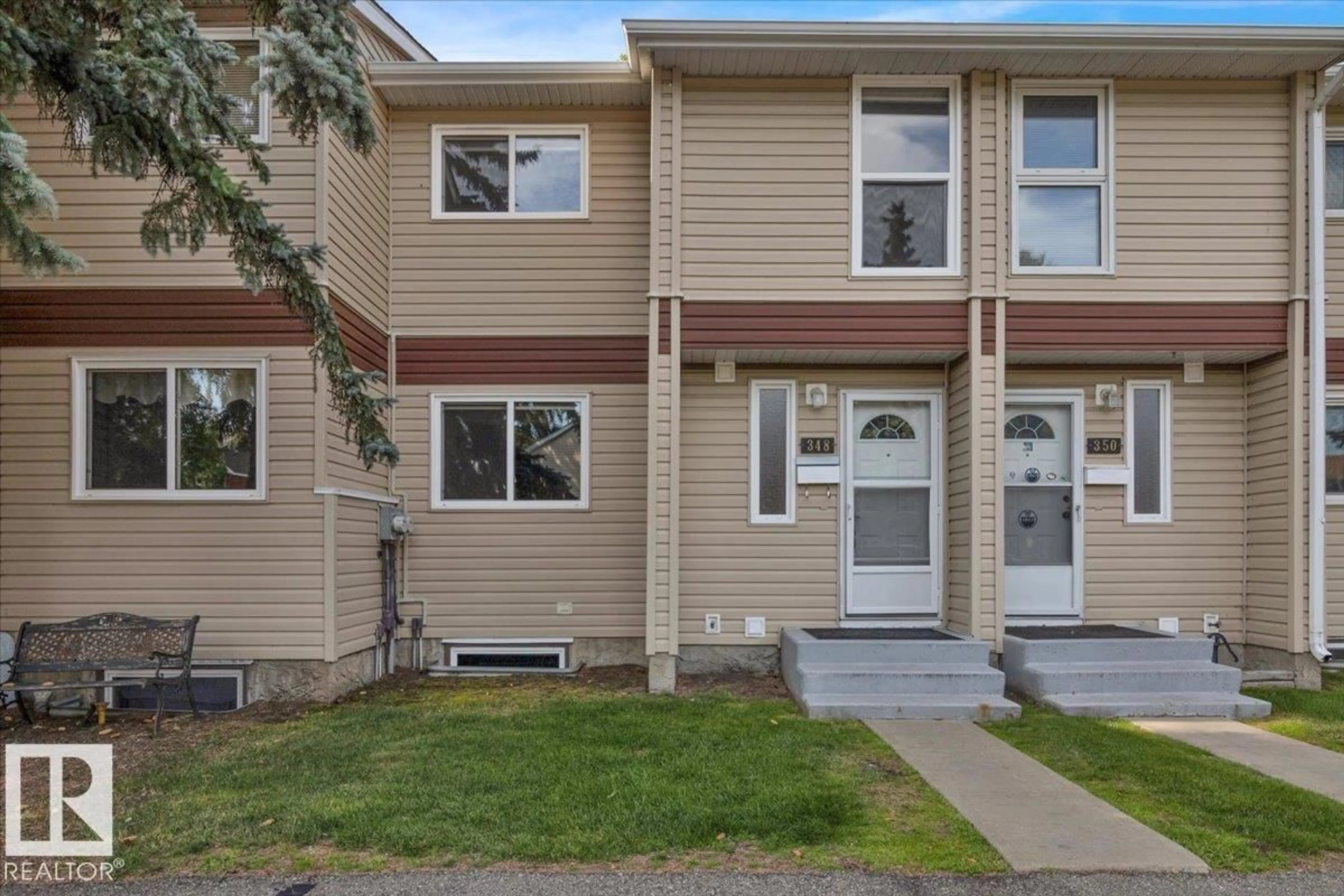 Home with vinyl exterior material, street for 348 CLAREVIEW RD, Edmonton Alberta T5A4G6
