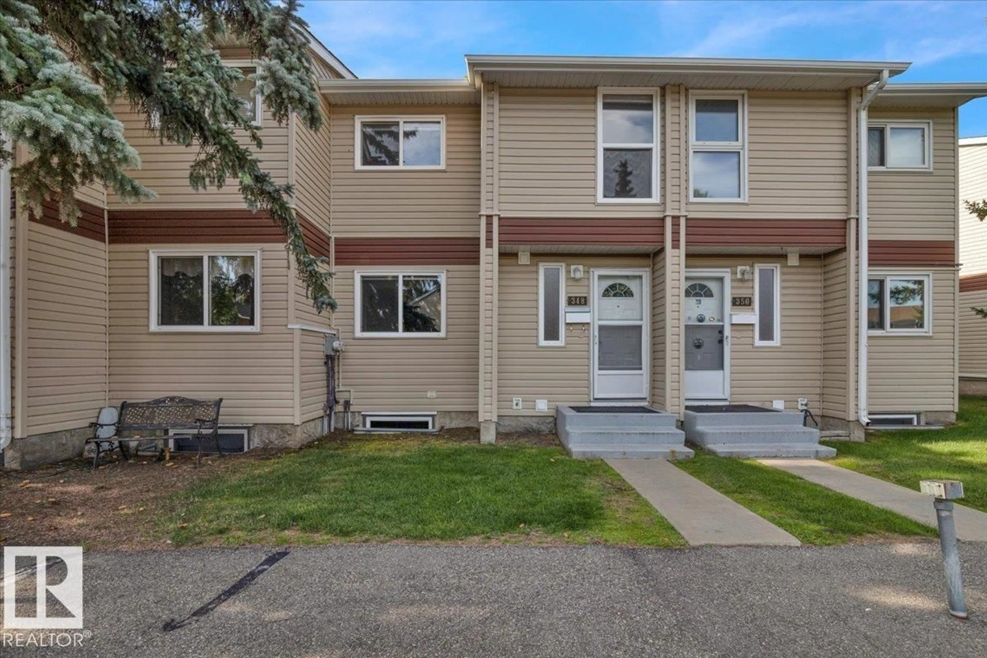 Home with vinyl exterior material, street for 348 CLAREVIEW RD, Edmonton Alberta T5A4G6