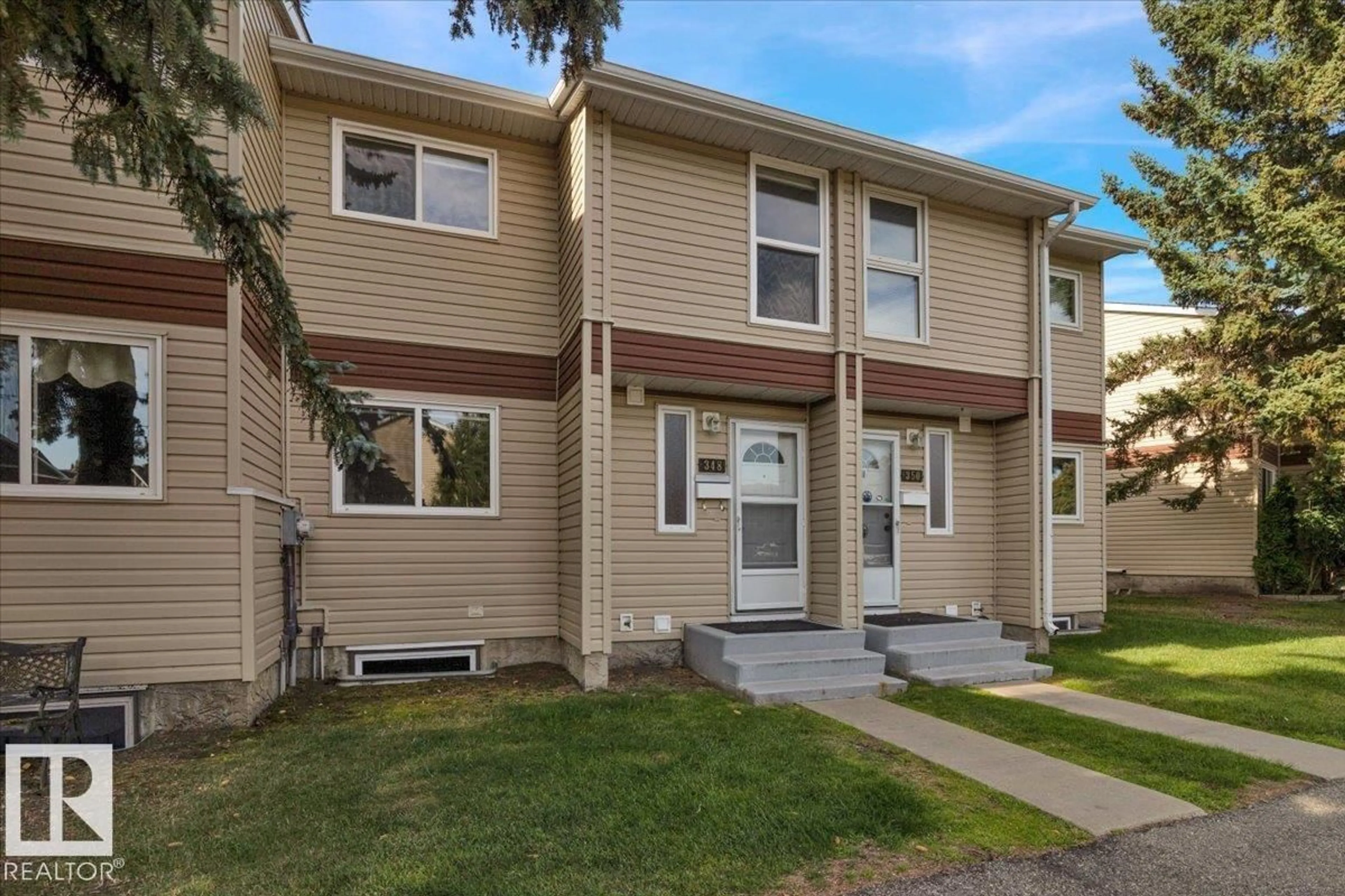 Home with vinyl exterior material, street for 348 CLAREVIEW RD, Edmonton Alberta T5A4G6