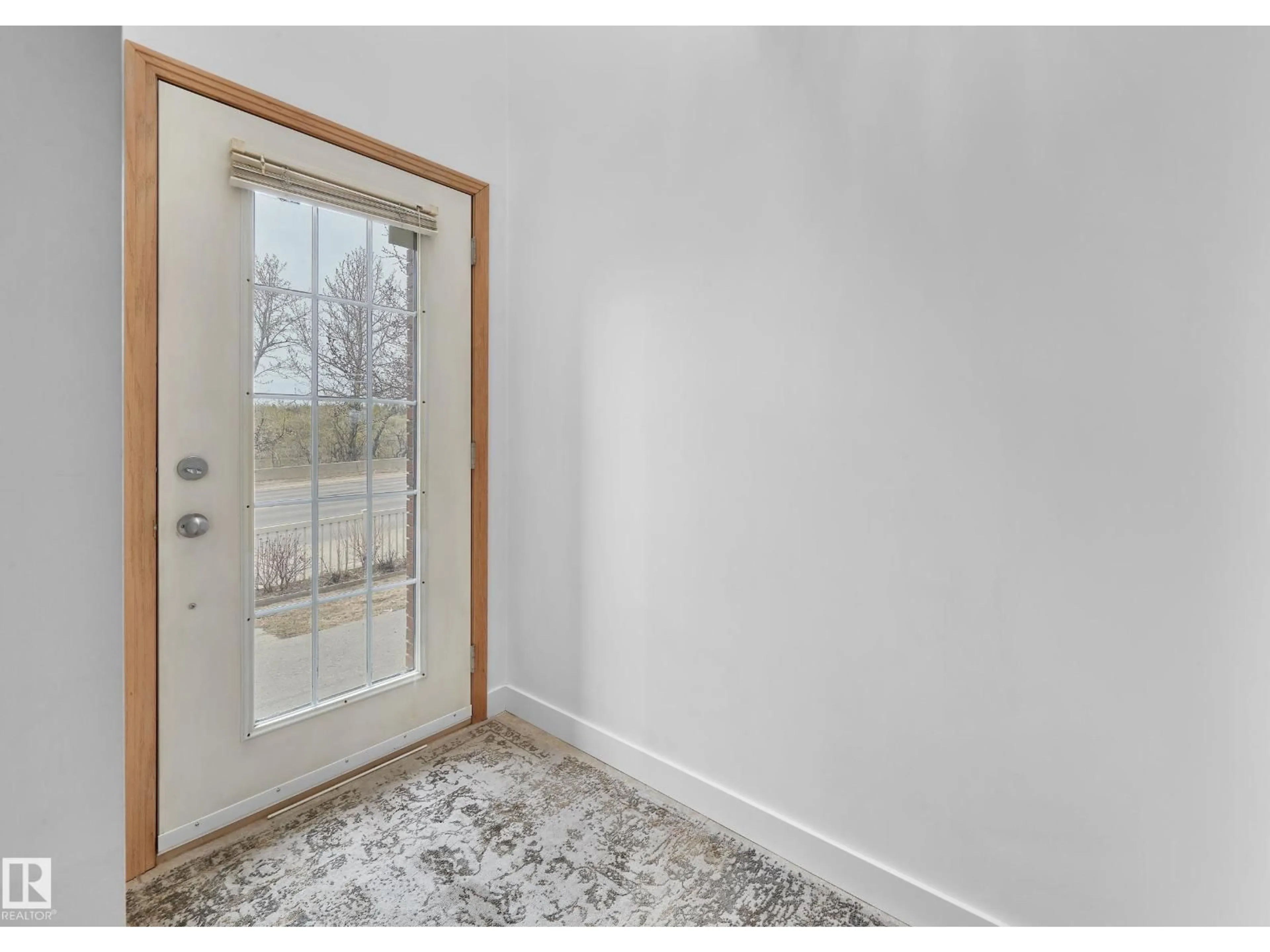 Indoor entryway for 9021 98 AV, Edmonton Alberta T6C4P2