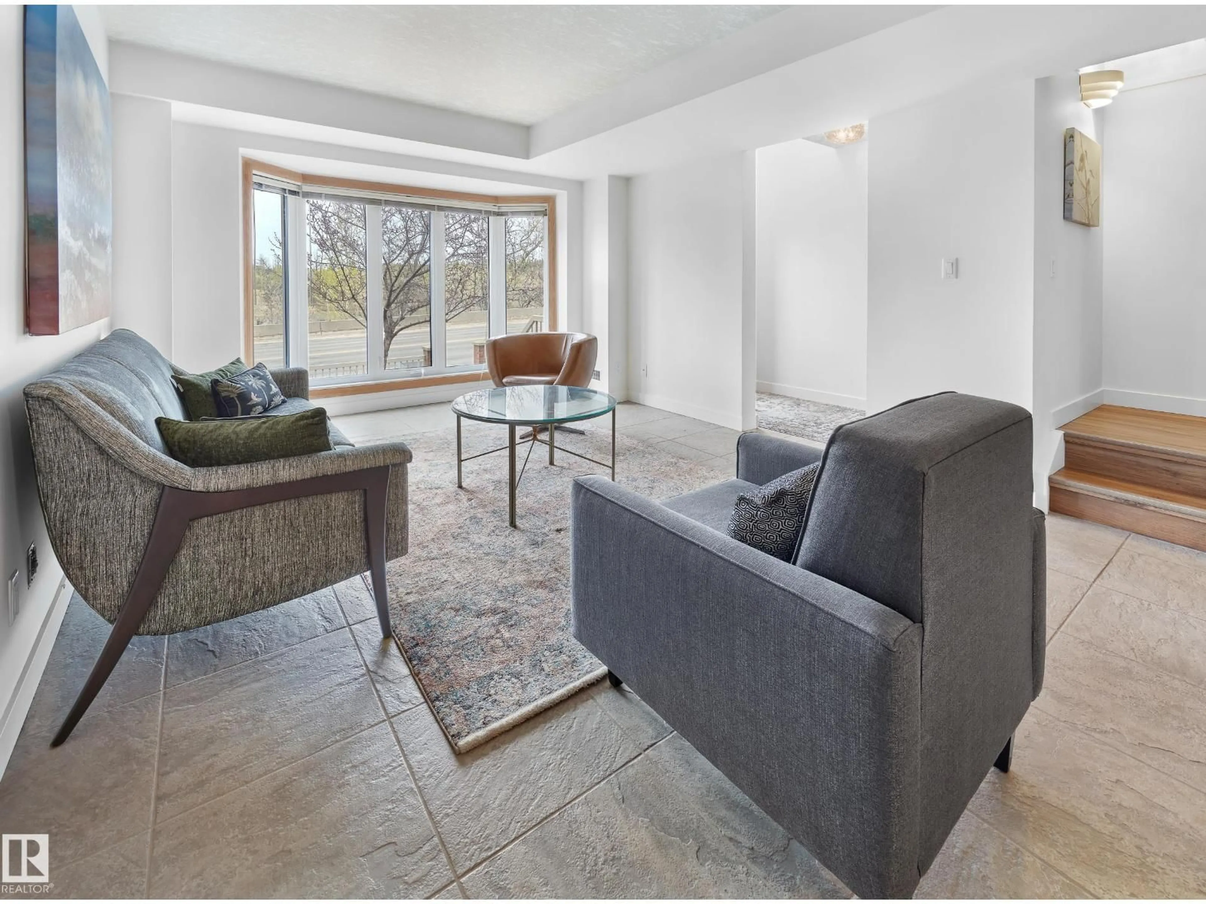 Living room with furniture, unknown for 9021 98 AV, Edmonton Alberta T6C4P2