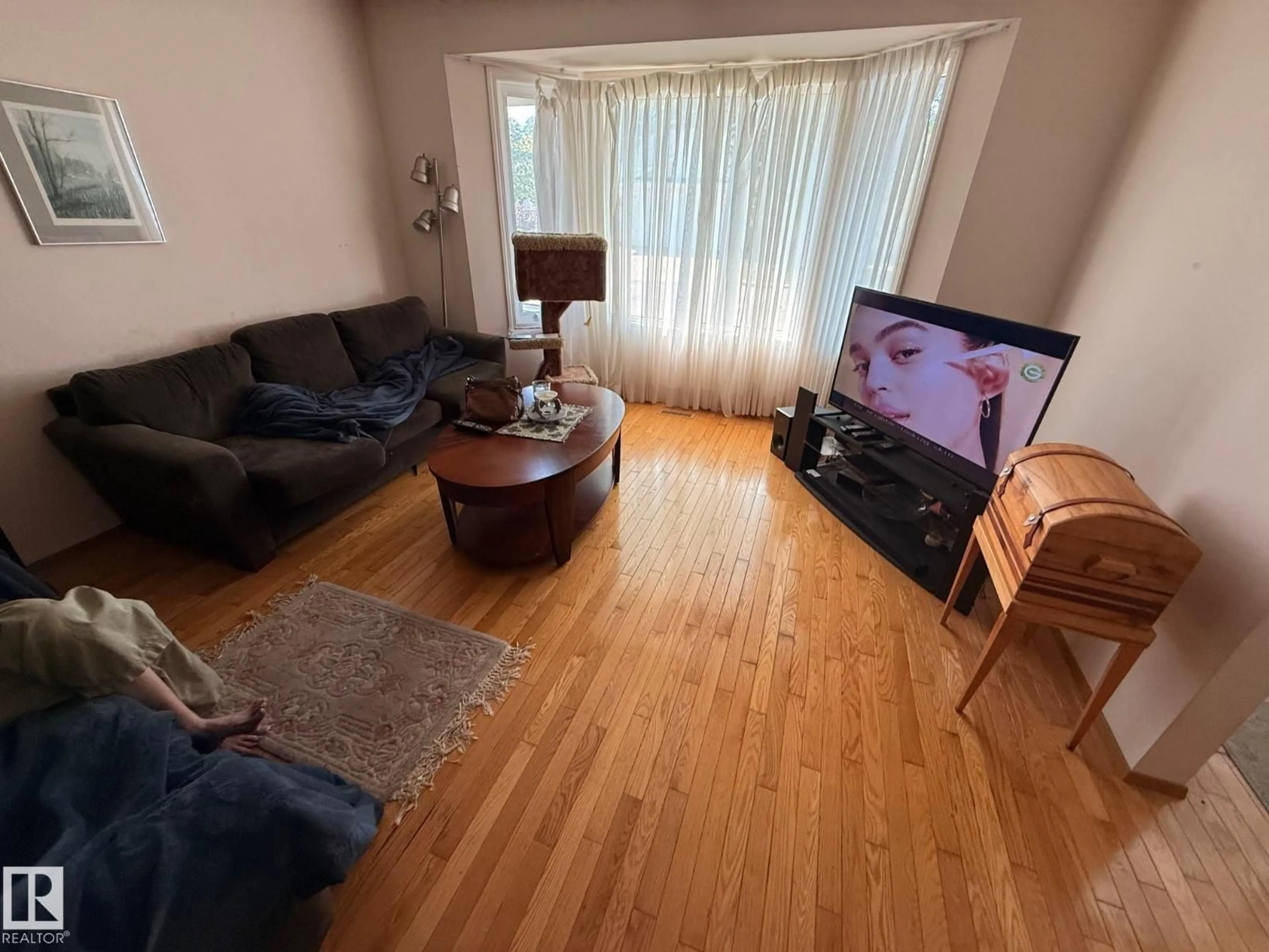 Living room with furniture, unknown for 5935 189 ST, Edmonton Alberta T6M2J2