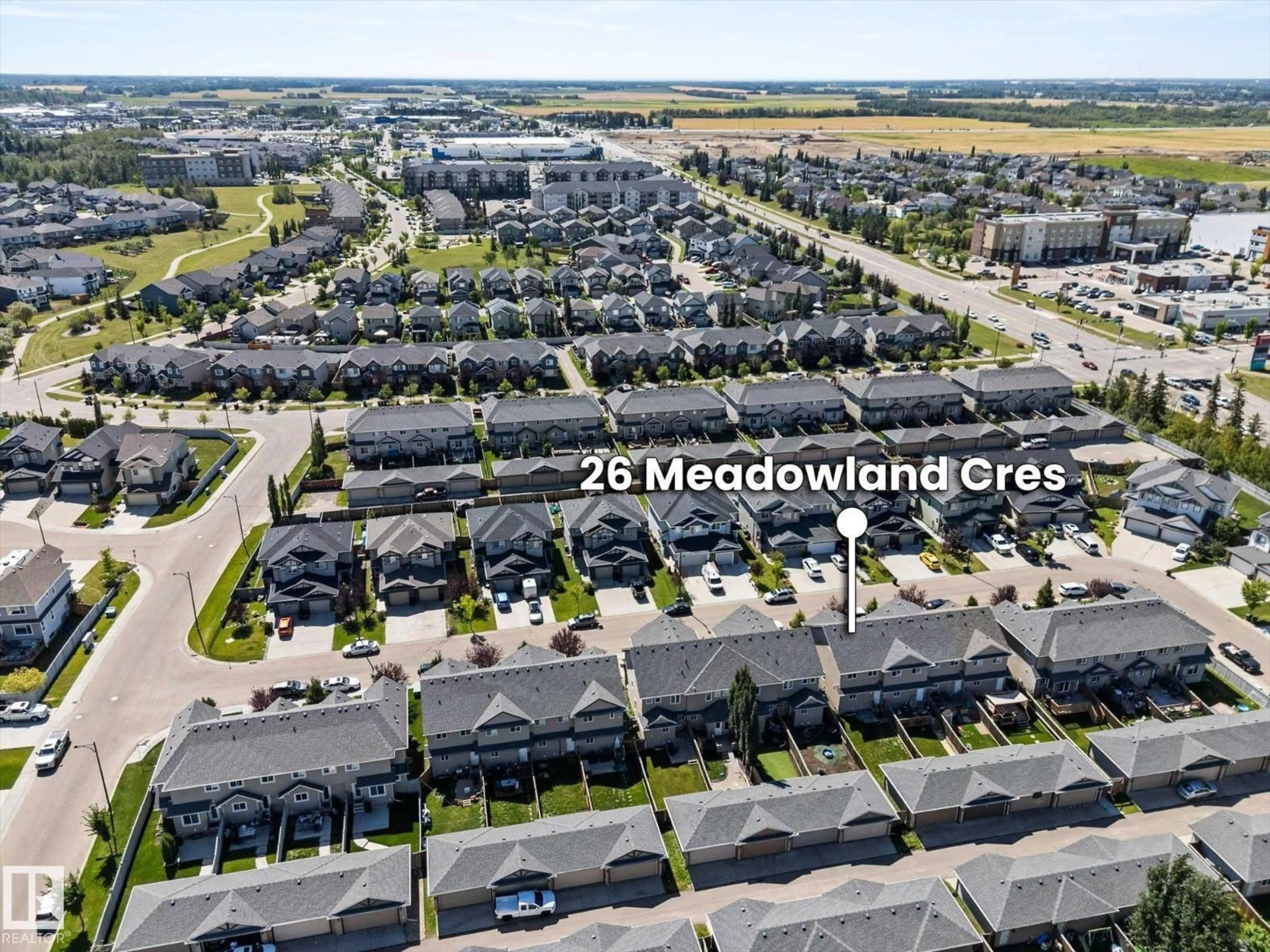 A pic from outside/outdoor area/front of a property/back of a property/a pic from drone, mountain view for 26 MEADOWLAND CR, Spruce Grove Alberta T7X0P9