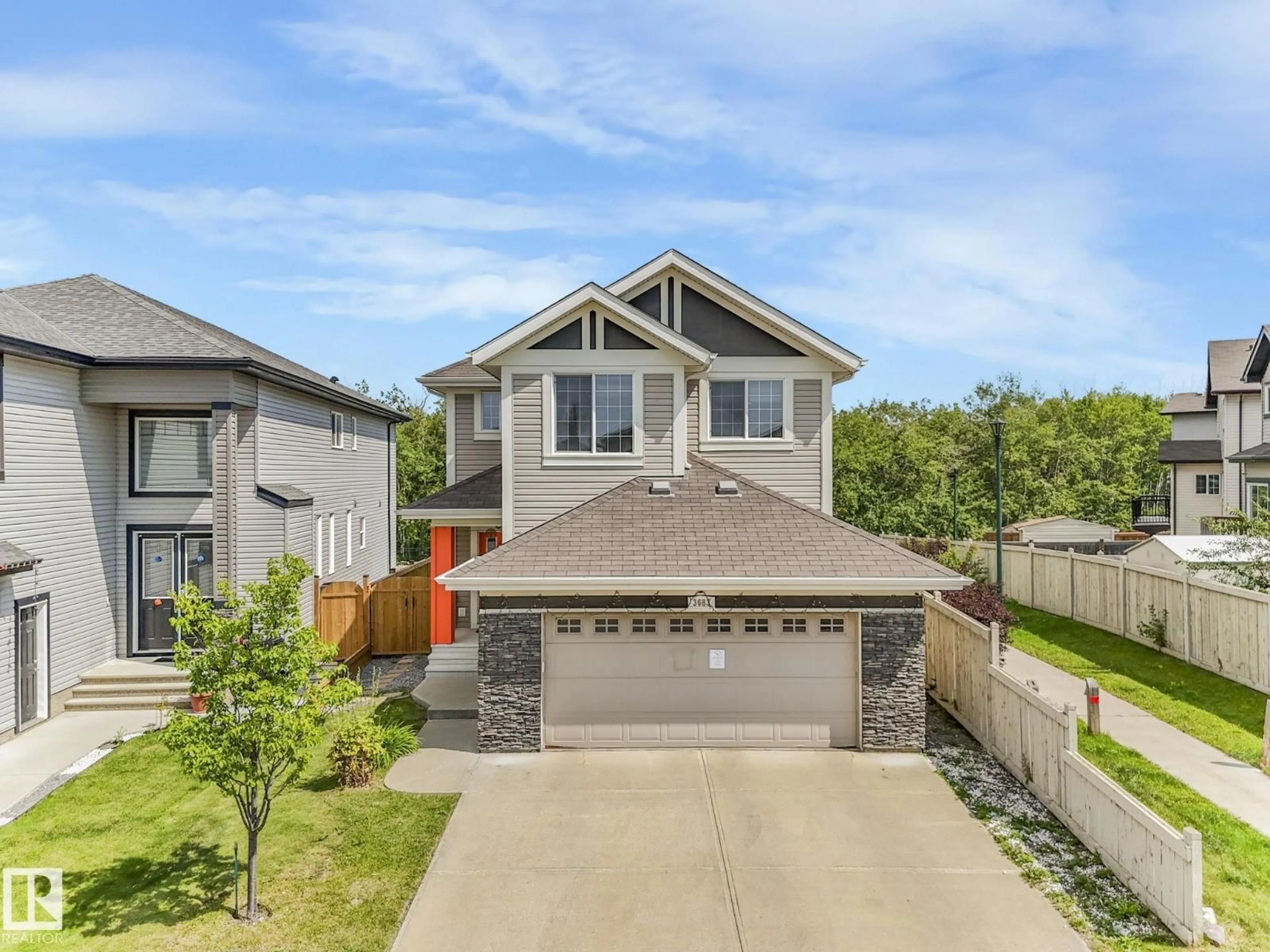 Home with vinyl exterior material, street for 3683 8 ST, Edmonton Alberta T6T0S3