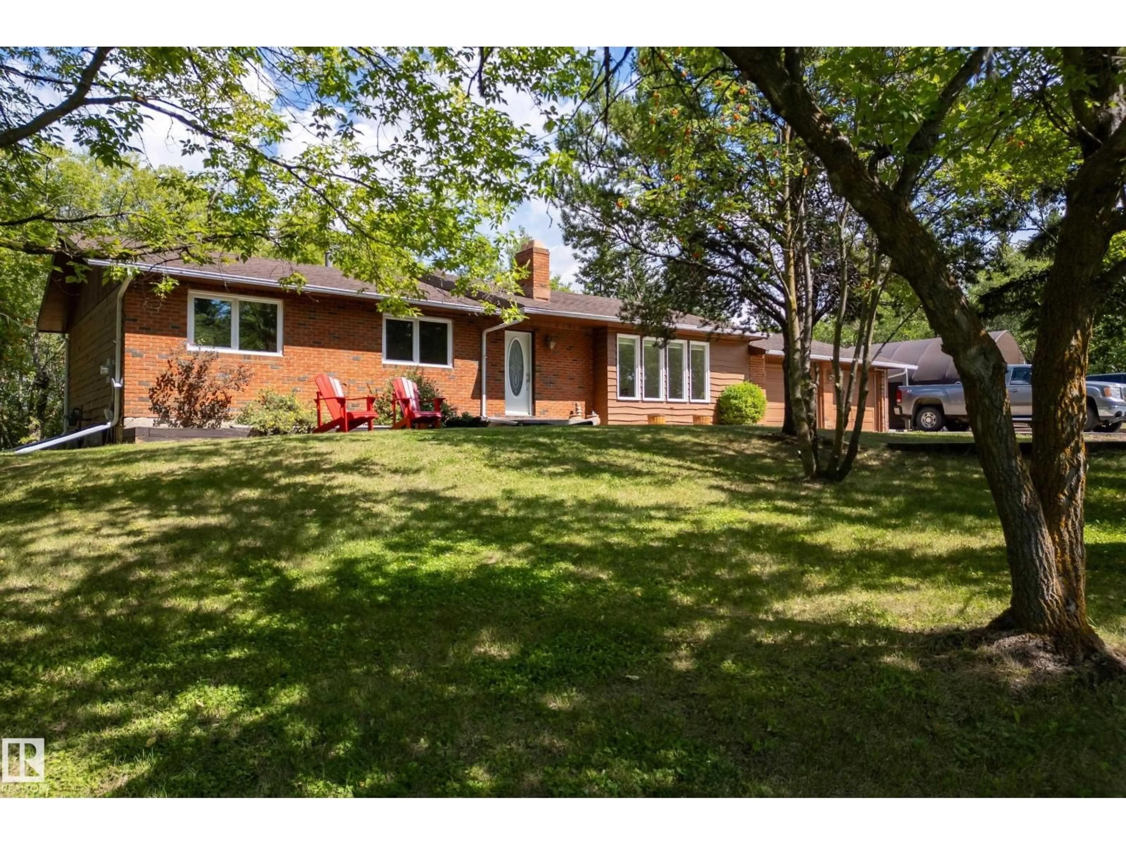 A pic from outside/outdoor area/front of a property/back of a property/a pic from drone, street for #14 - 52063 RGE ROAD 225, Rural Strathcona County Alberta T8C1C3
