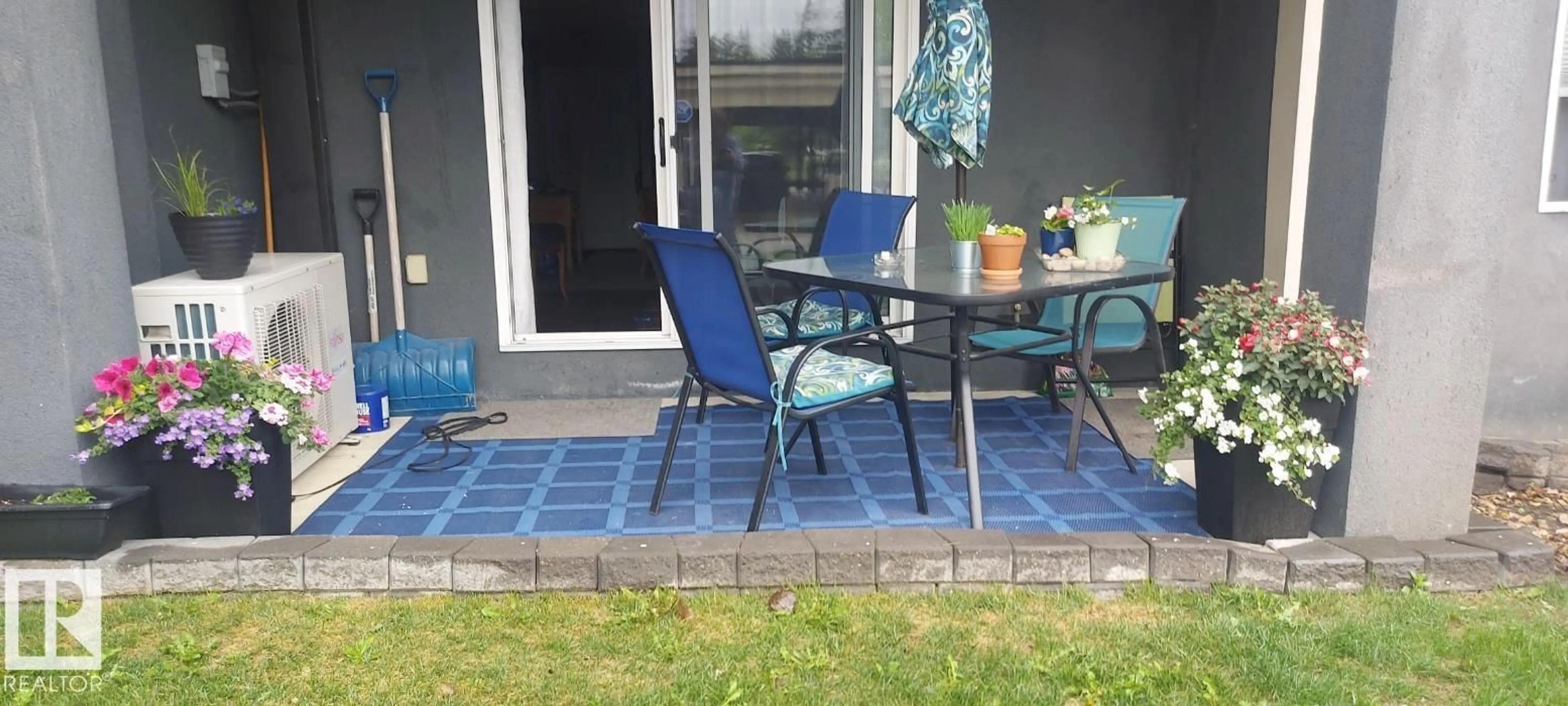Patio, street for 592 - 135 HOOKE RD, Edmonton Alberta T5A5H2