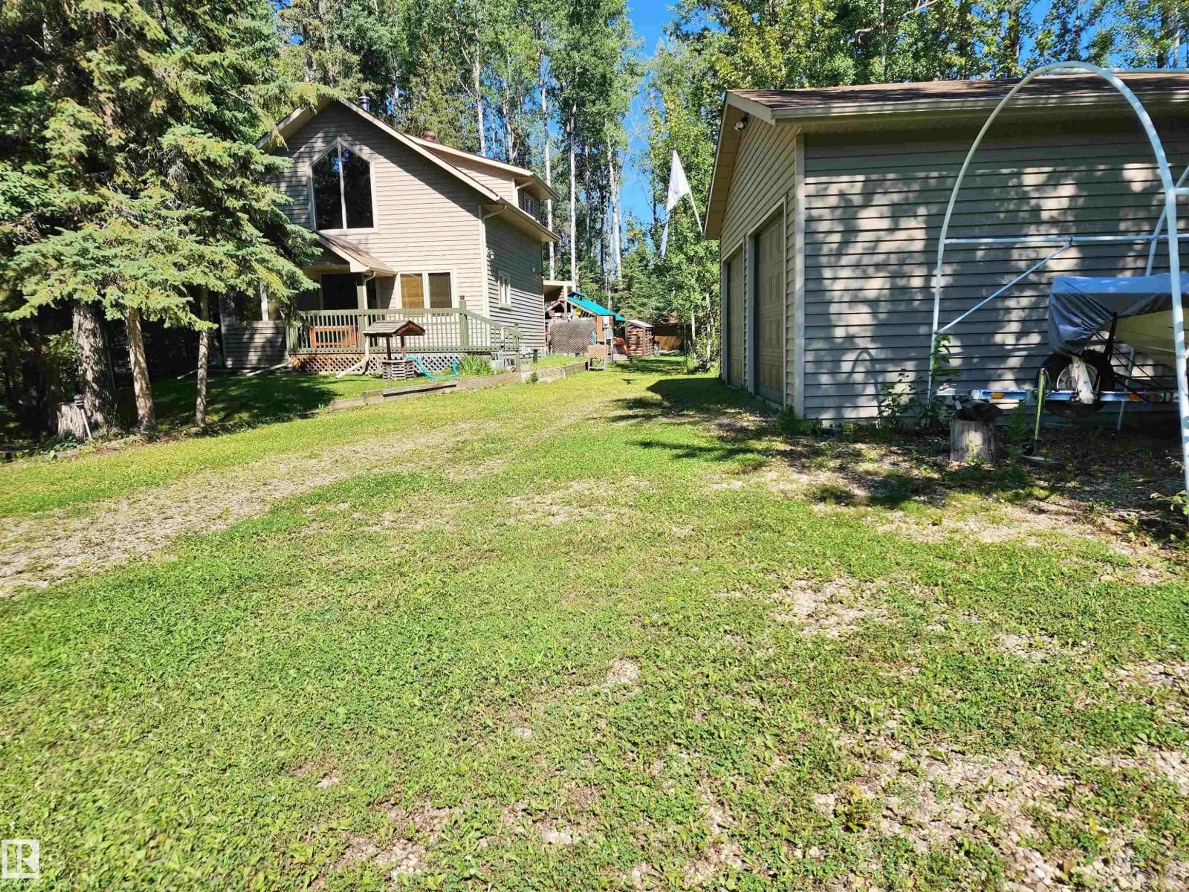 A pic from outside/outdoor area/front of a property/back of a property/a pic from drone, forest/trees view for 410 - 55061 TWP ROAD 462, Rural Wetaskiwin County Alberta T0C0T0