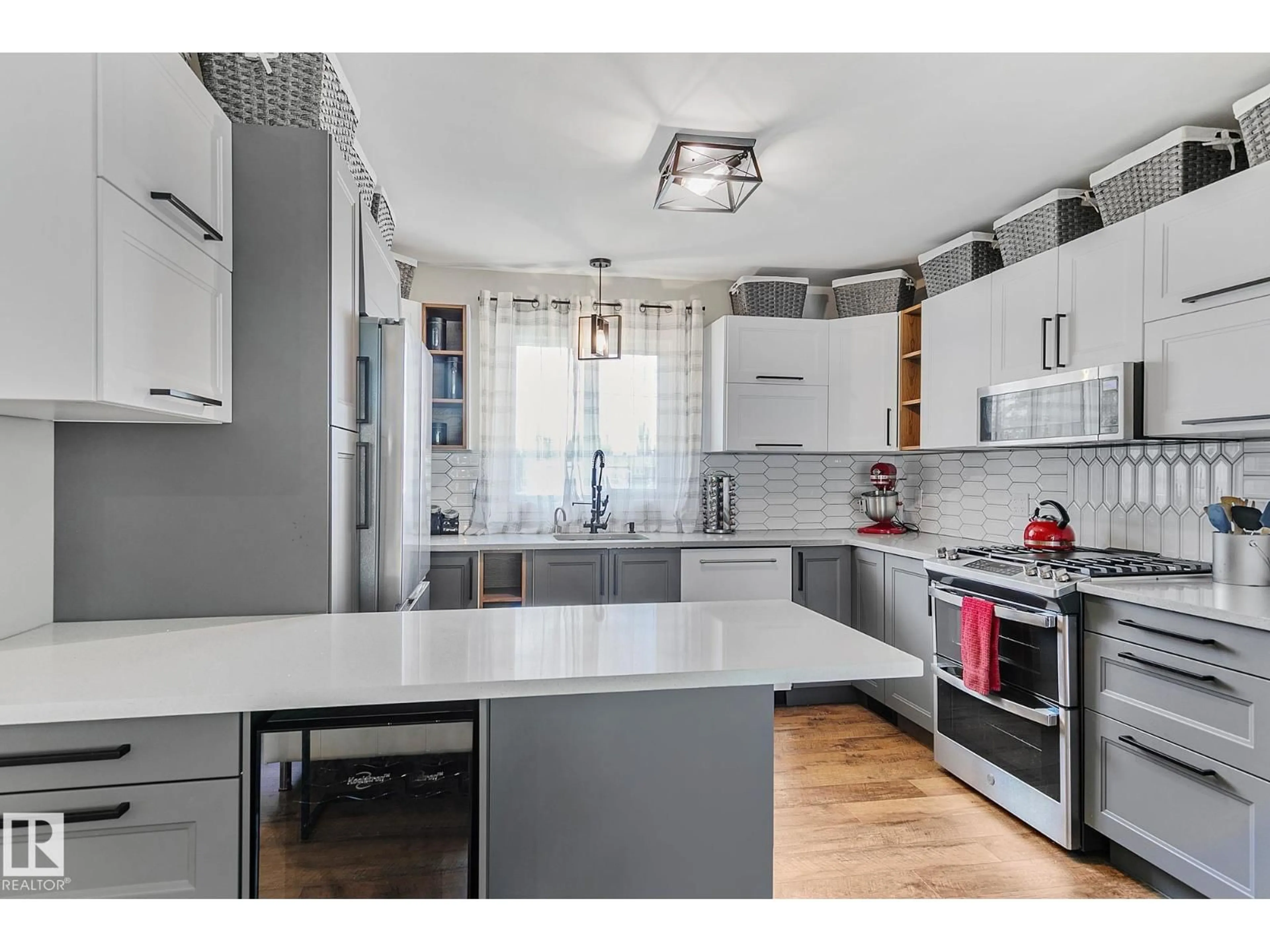 Open concept kitchen, ceramic/tile floor for 7531 76 AV, Edmonton Alberta T6C0H3