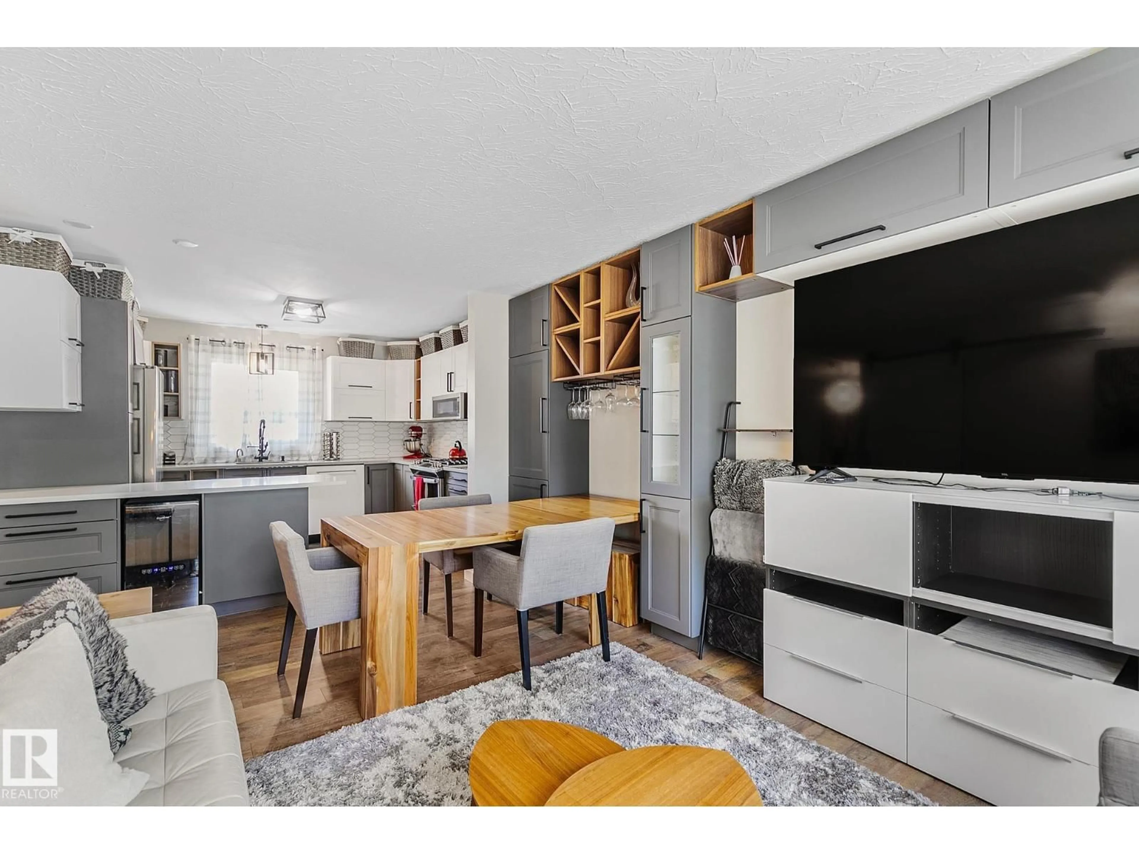 Open concept kitchen, wood/laminate floor for 7531 76 AV, Edmonton Alberta T6C0H3