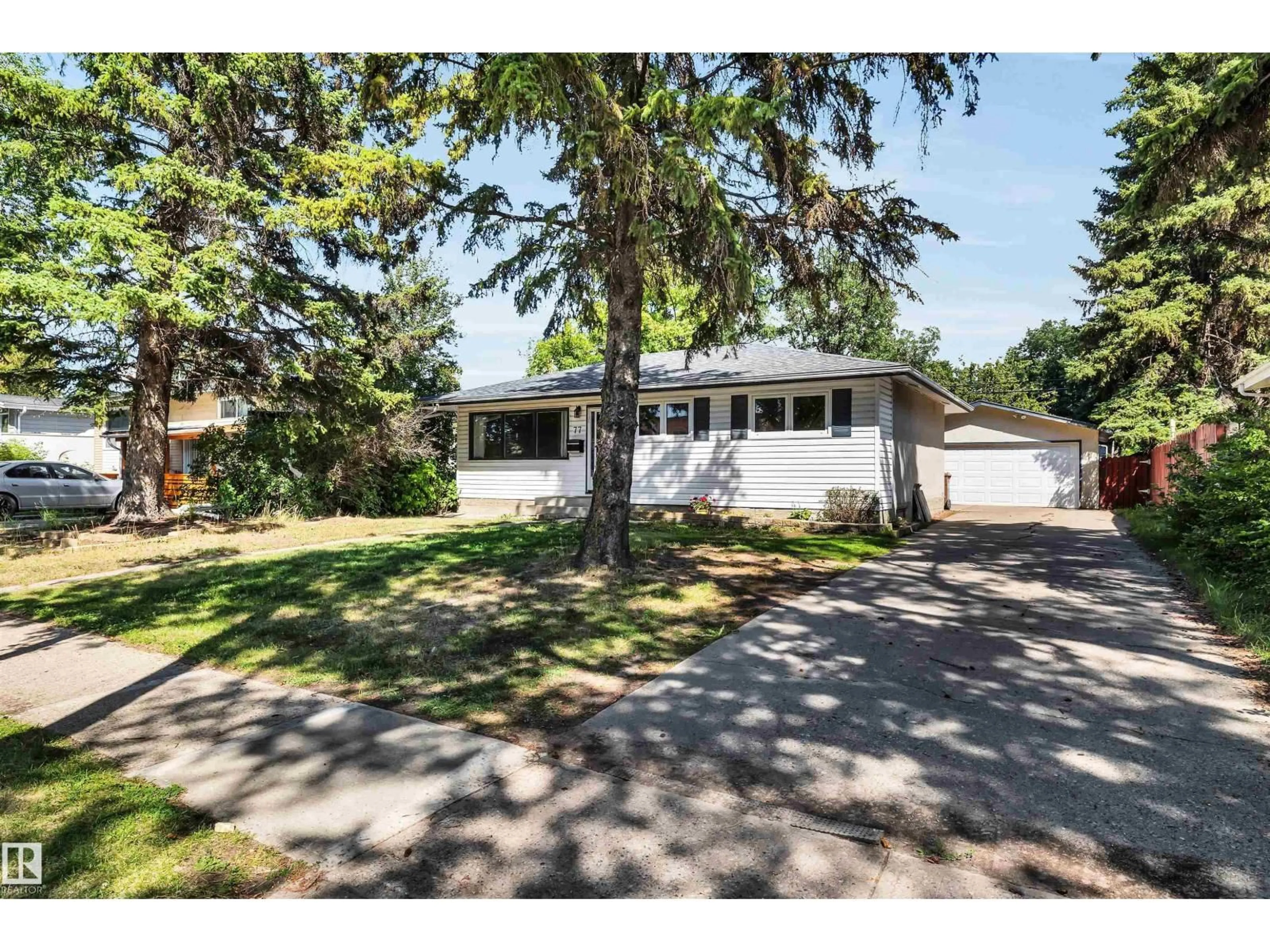 Home with vinyl exterior material, street for 77 GROSVENOR BV, St. Albert Alberta T8N0X8