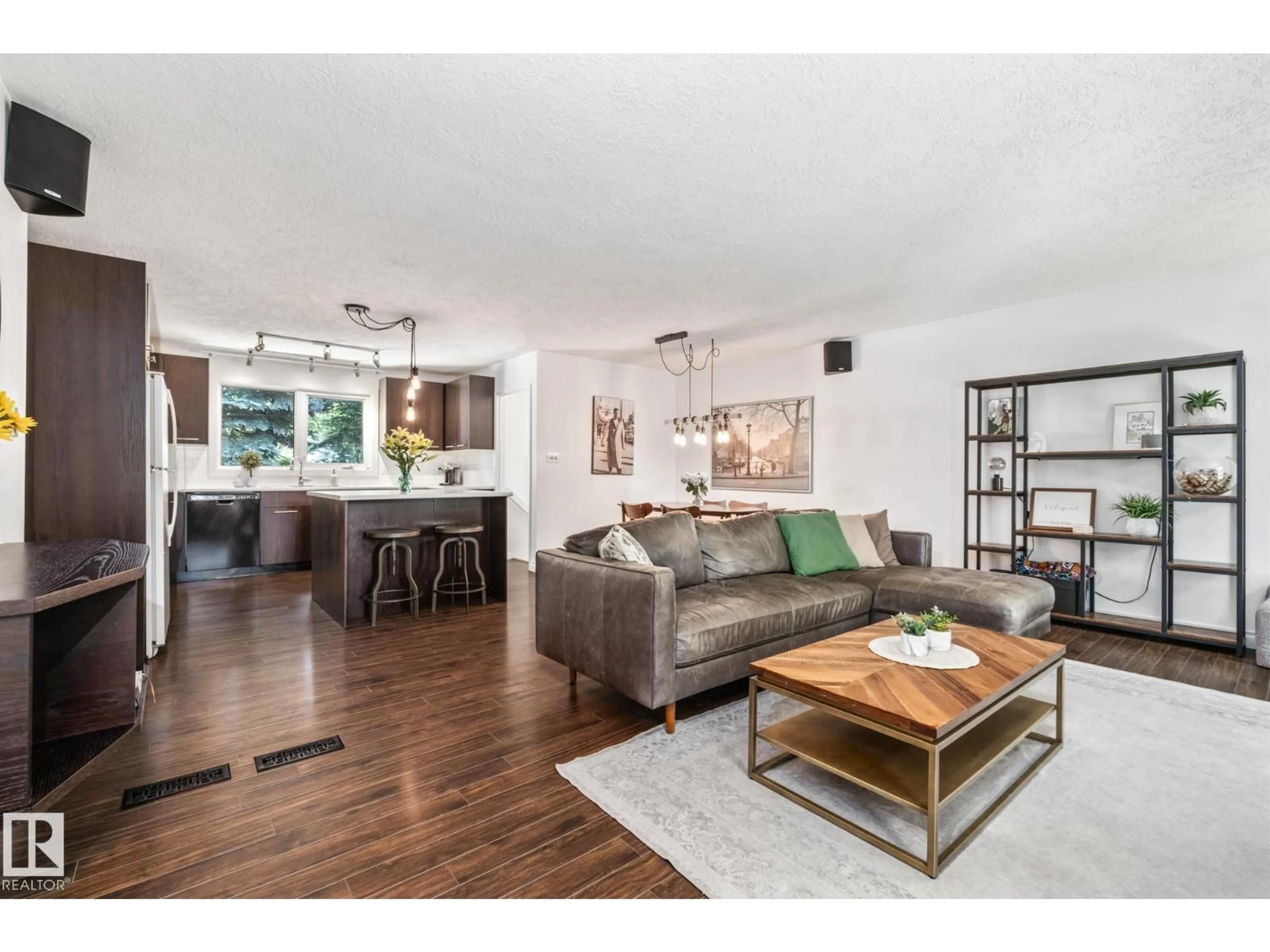 Living room with furniture, wood/laminate floor for 72 FLINT CR, St. Albert Alberta T8N1Y8