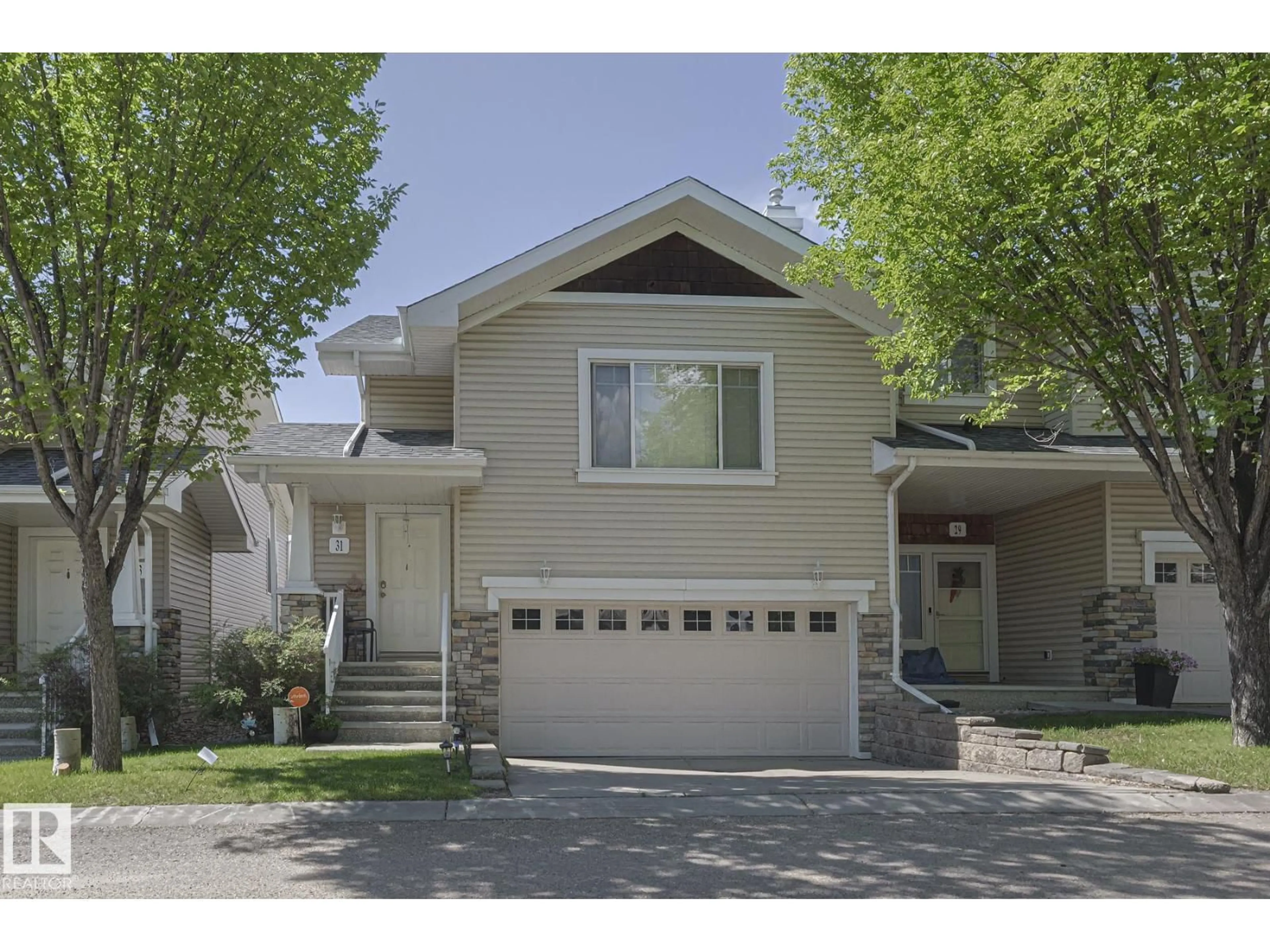 Home with vinyl exterior material, street for #31 - 2508 HANNA CR, Edmonton Alberta T6R3N7