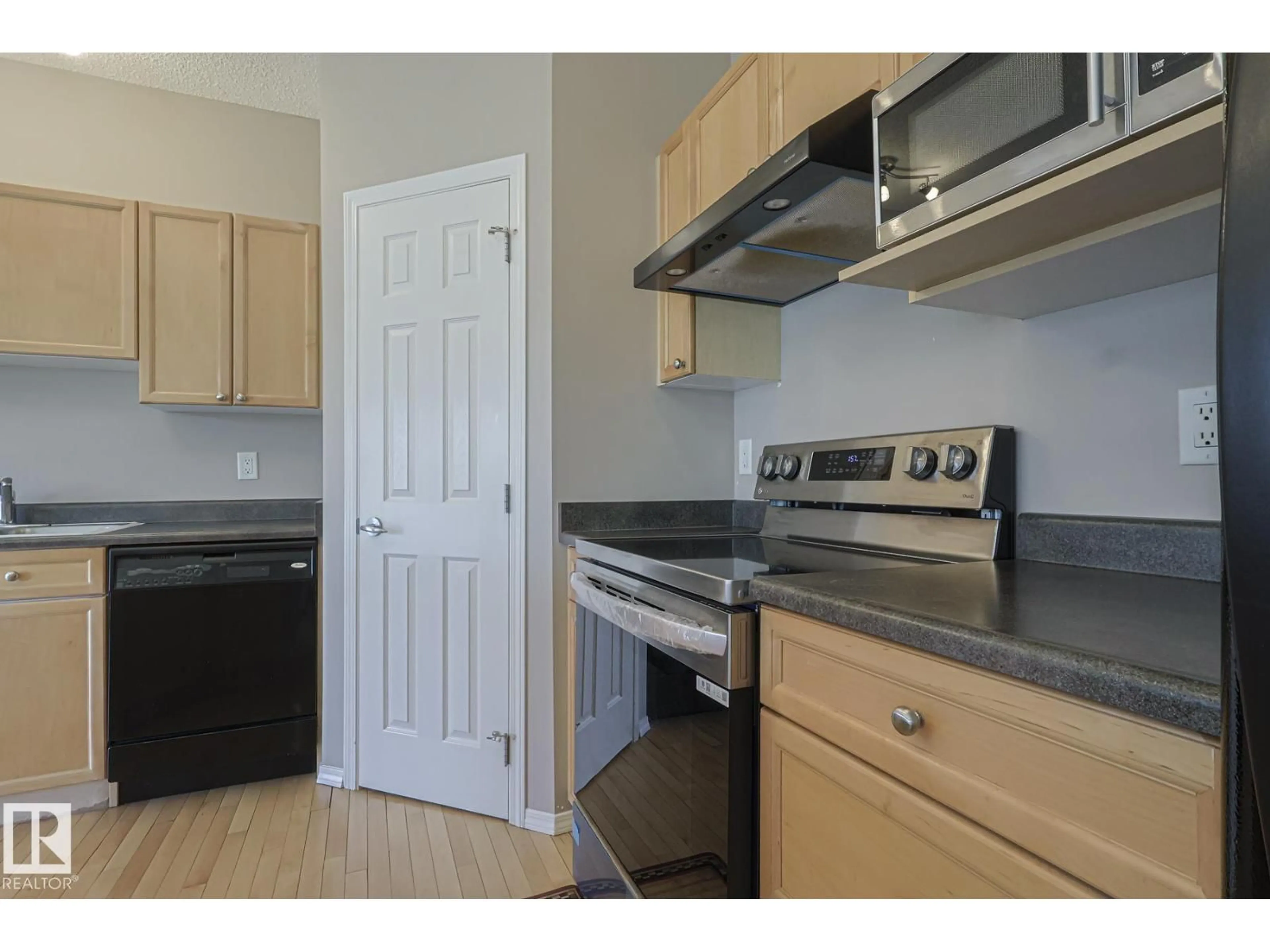 Standard kitchen, wood/laminate floor for #31 - 2508 HANNA CR, Edmonton Alberta T6R3N7