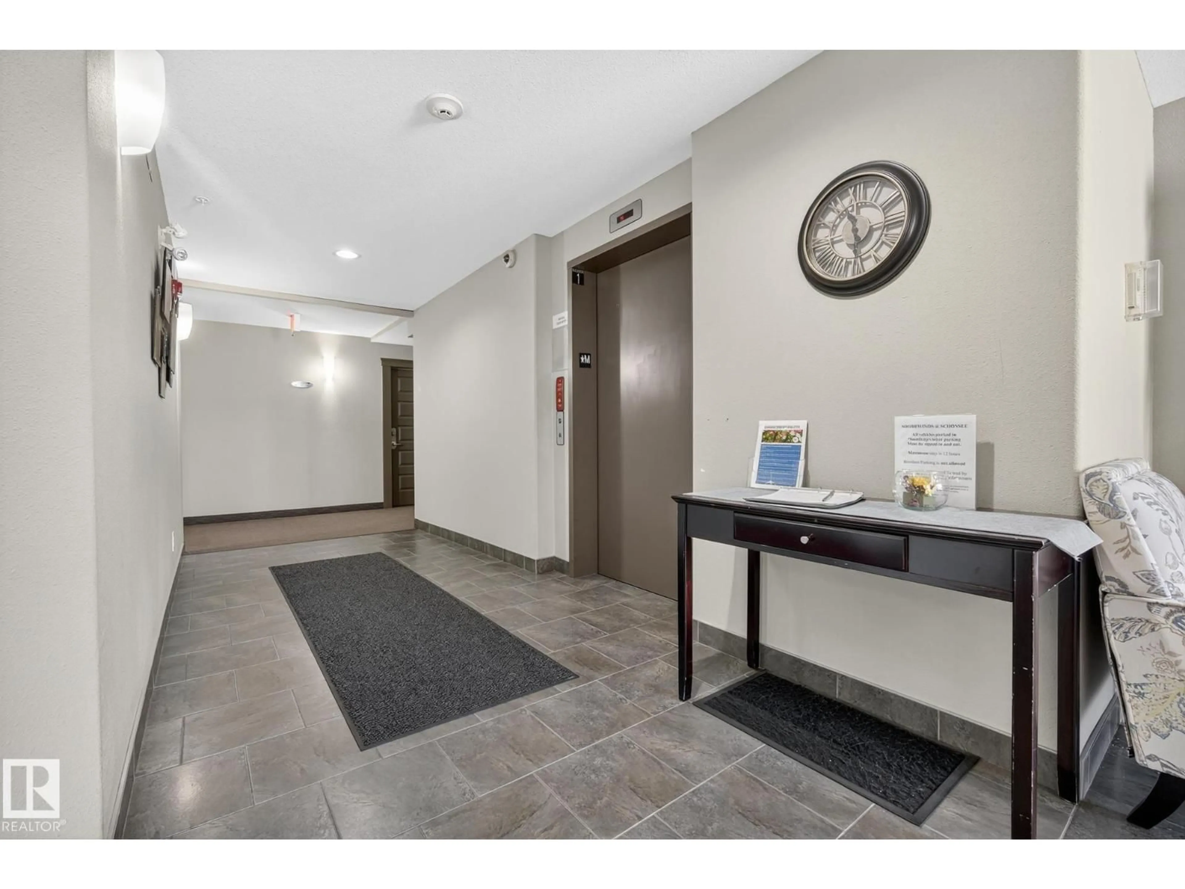 Indoor foyer for 310 - 6070 SCHONSEE WY, Edmonton Alberta T5Z0G8