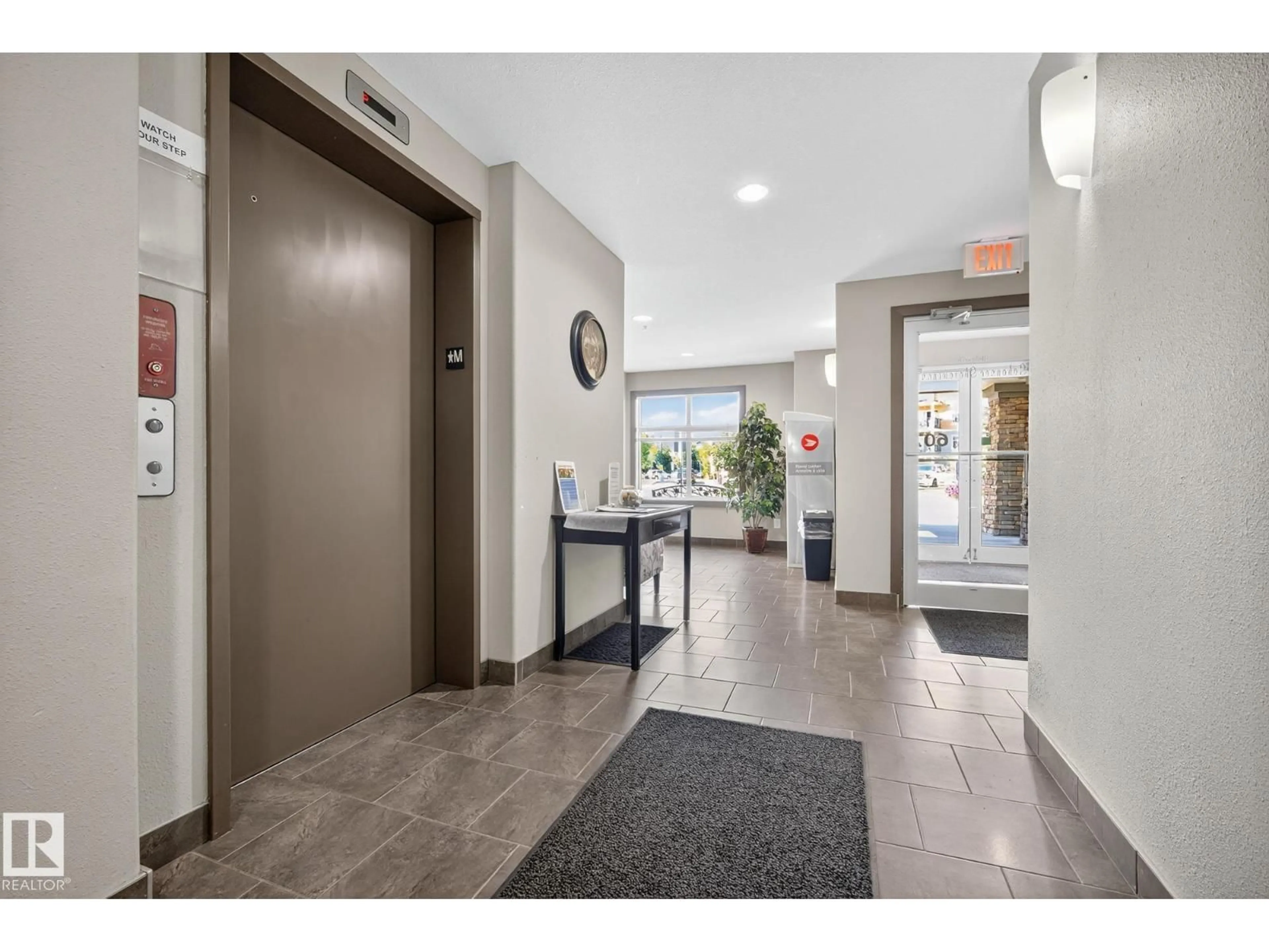 Indoor foyer for 310 - 6070 SCHONSEE WY, Edmonton Alberta T5Z0G8