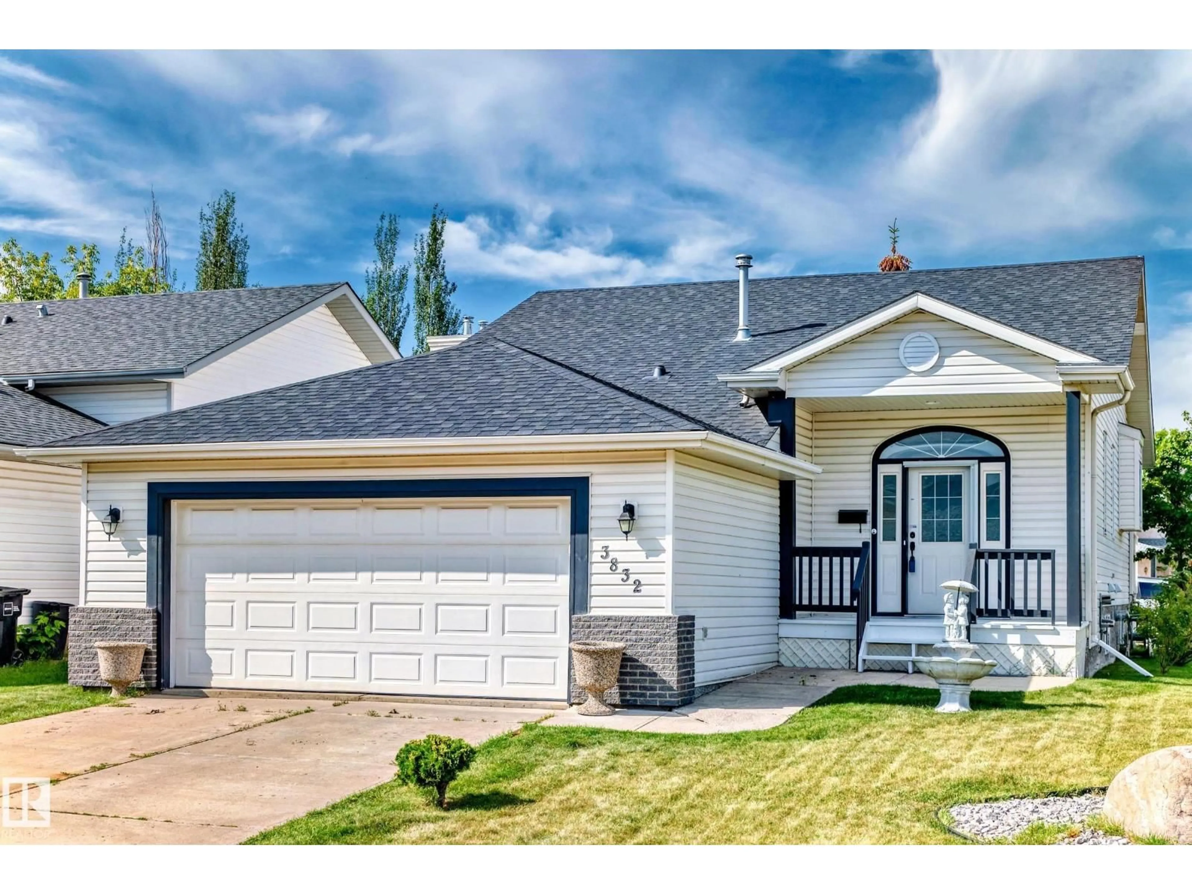 Home with vinyl exterior material, street for 3832 41 ST, Edmonton Alberta T6L6R5