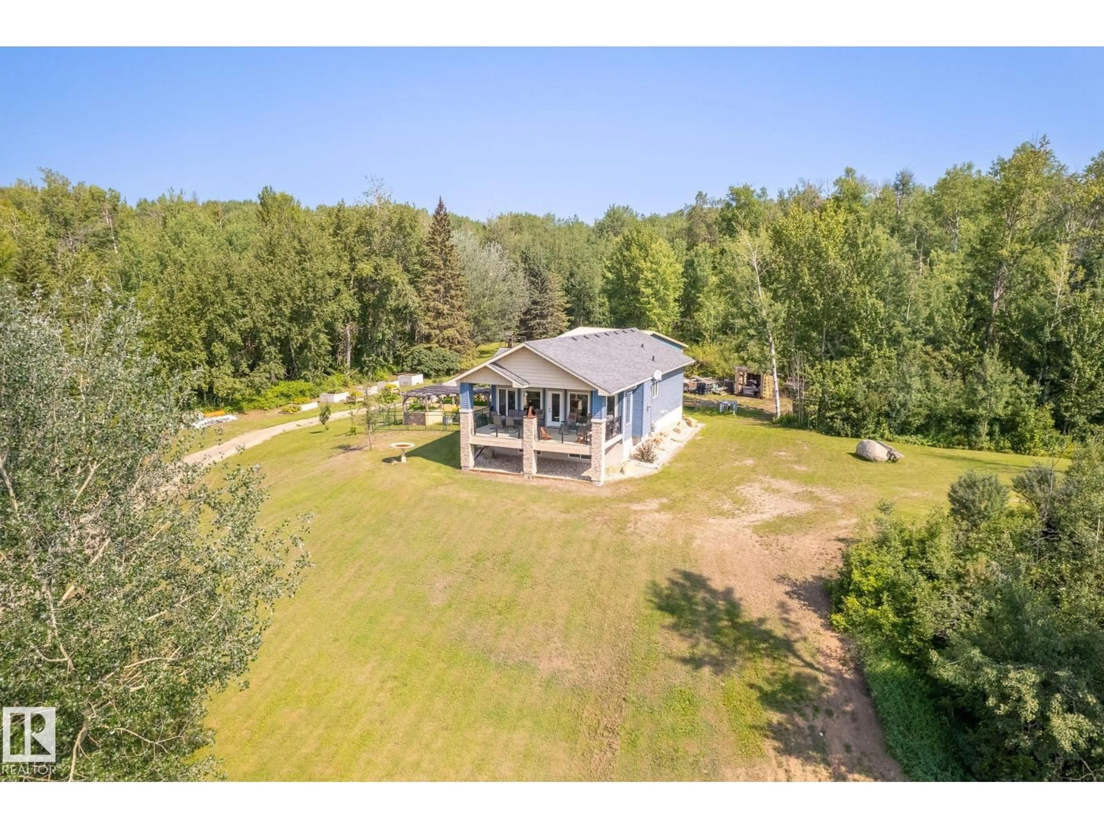 A pic from outside/outdoor area/front of a property/back of a property/a pic from drone, water/lake/river/ocean view for 4518 LAKESHORE RD, Rural Parkland County Alberta T0E2K0