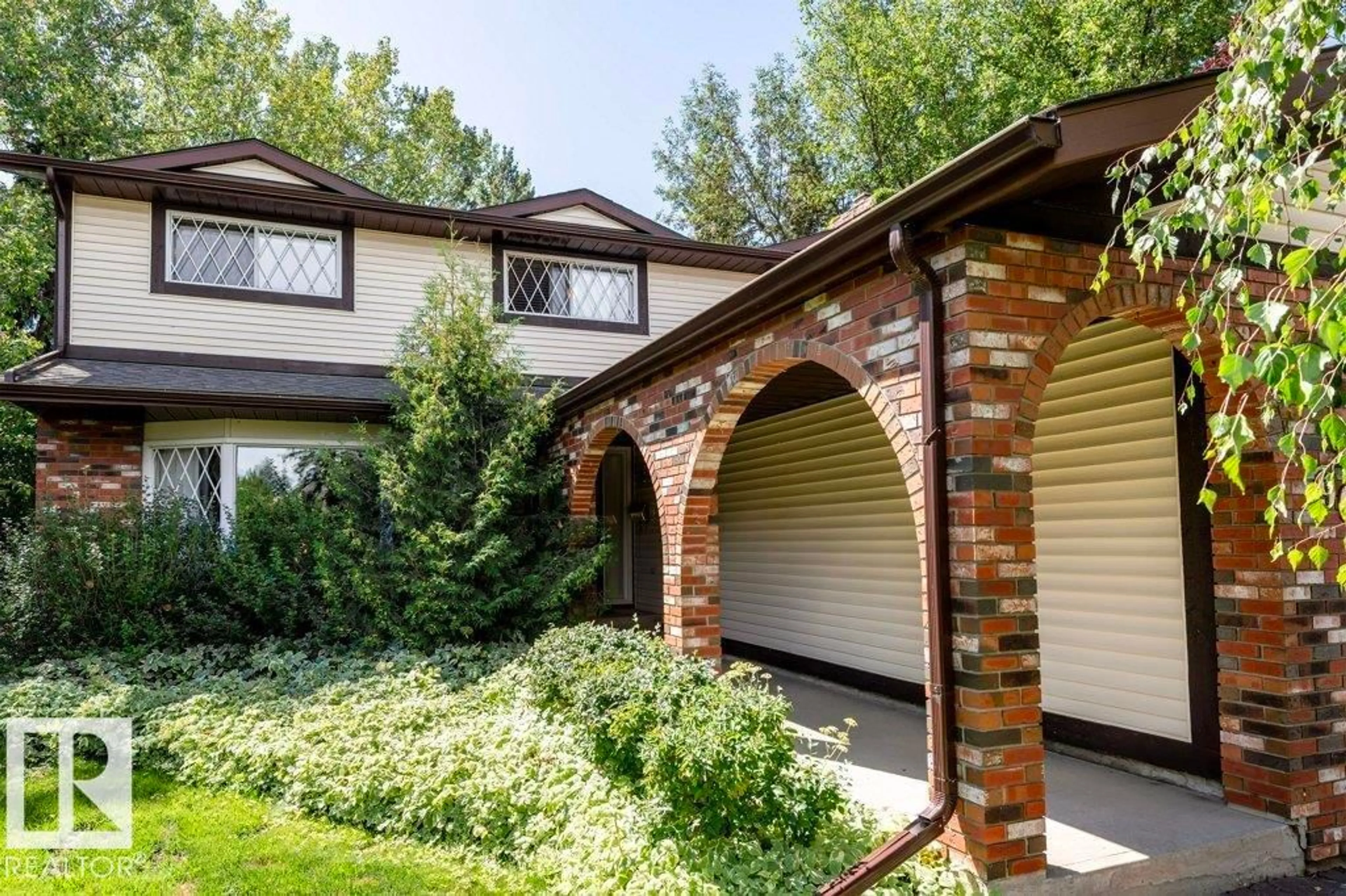 Home with brick exterior material, street for 905 RICE RD, Edmonton Alberta T6R1B1