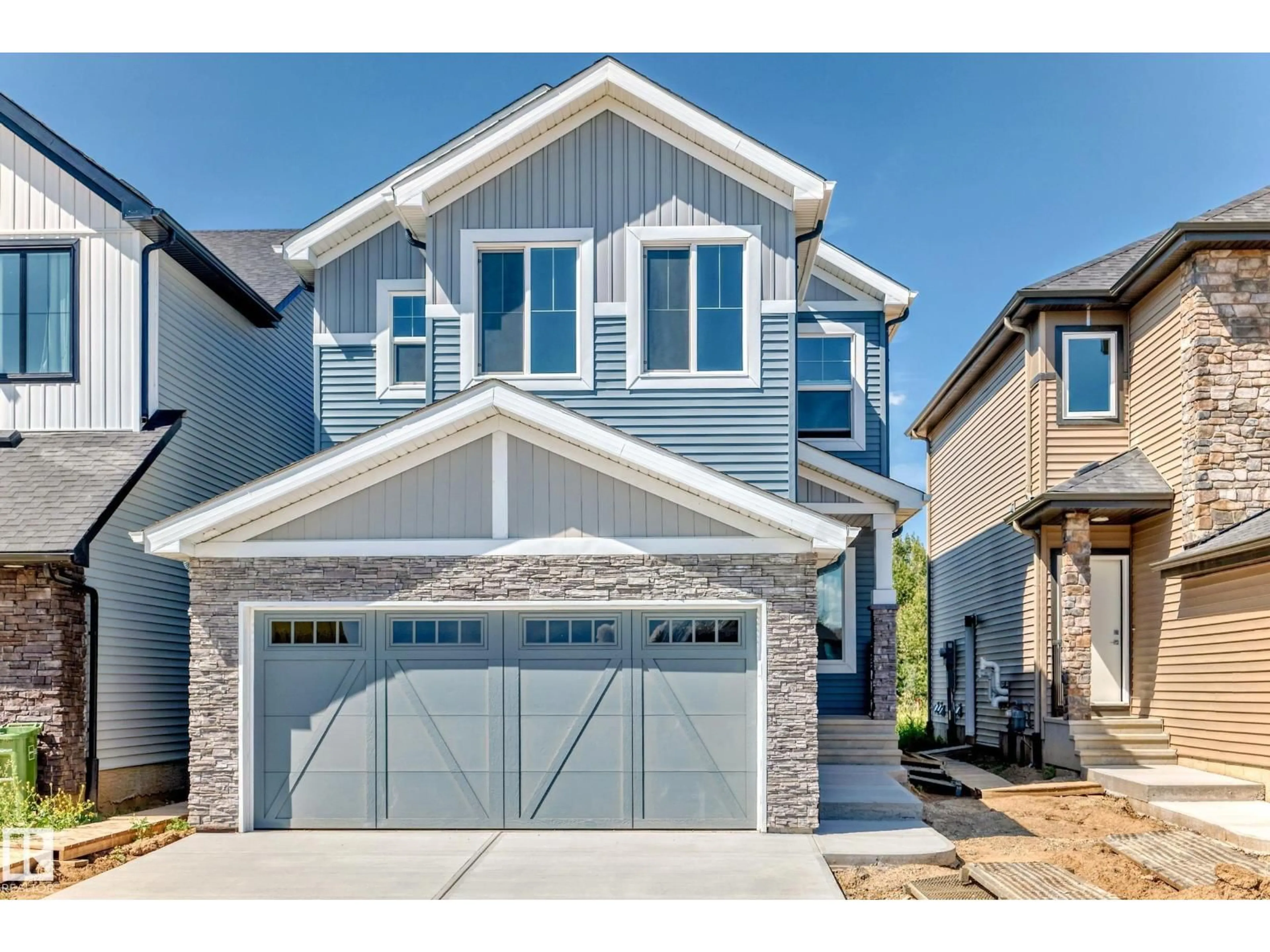 Home with brick exterior material, street for 631 KINGLET BV, Edmonton Alberta T5S0S8