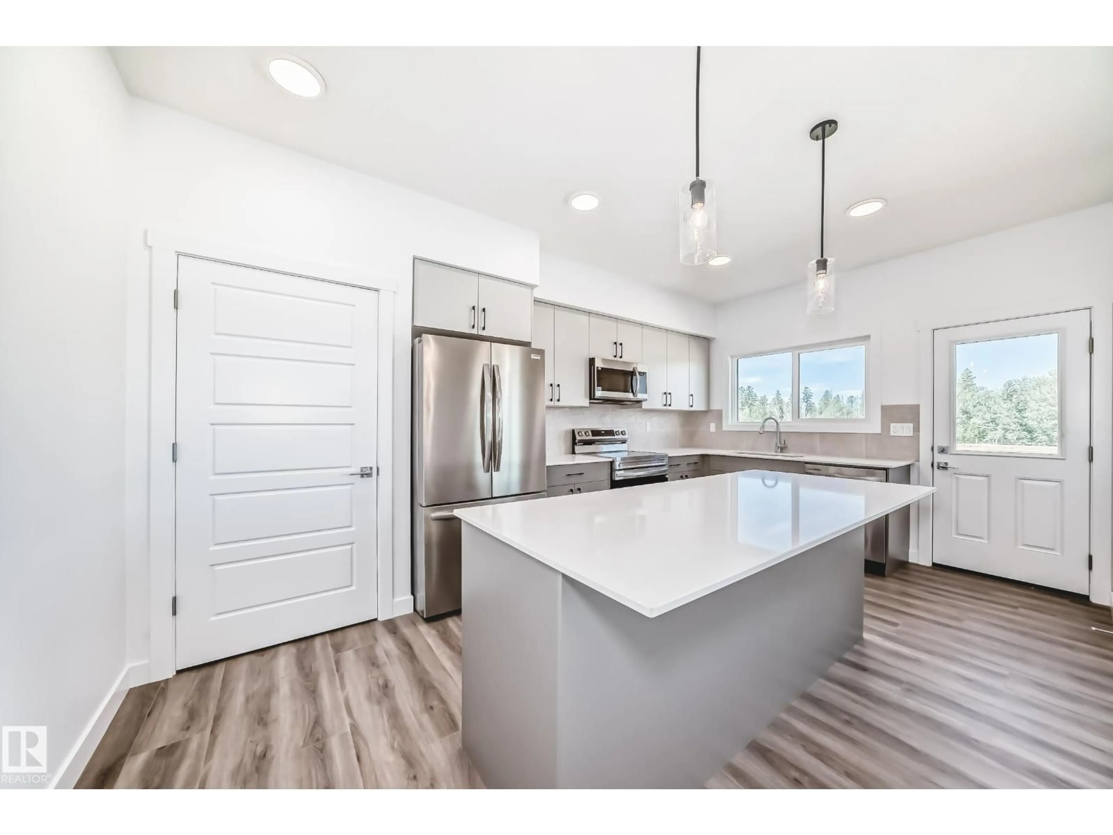 Open concept kitchen, unknown for 631 KINGLET BV, Edmonton Alberta T5S0S8