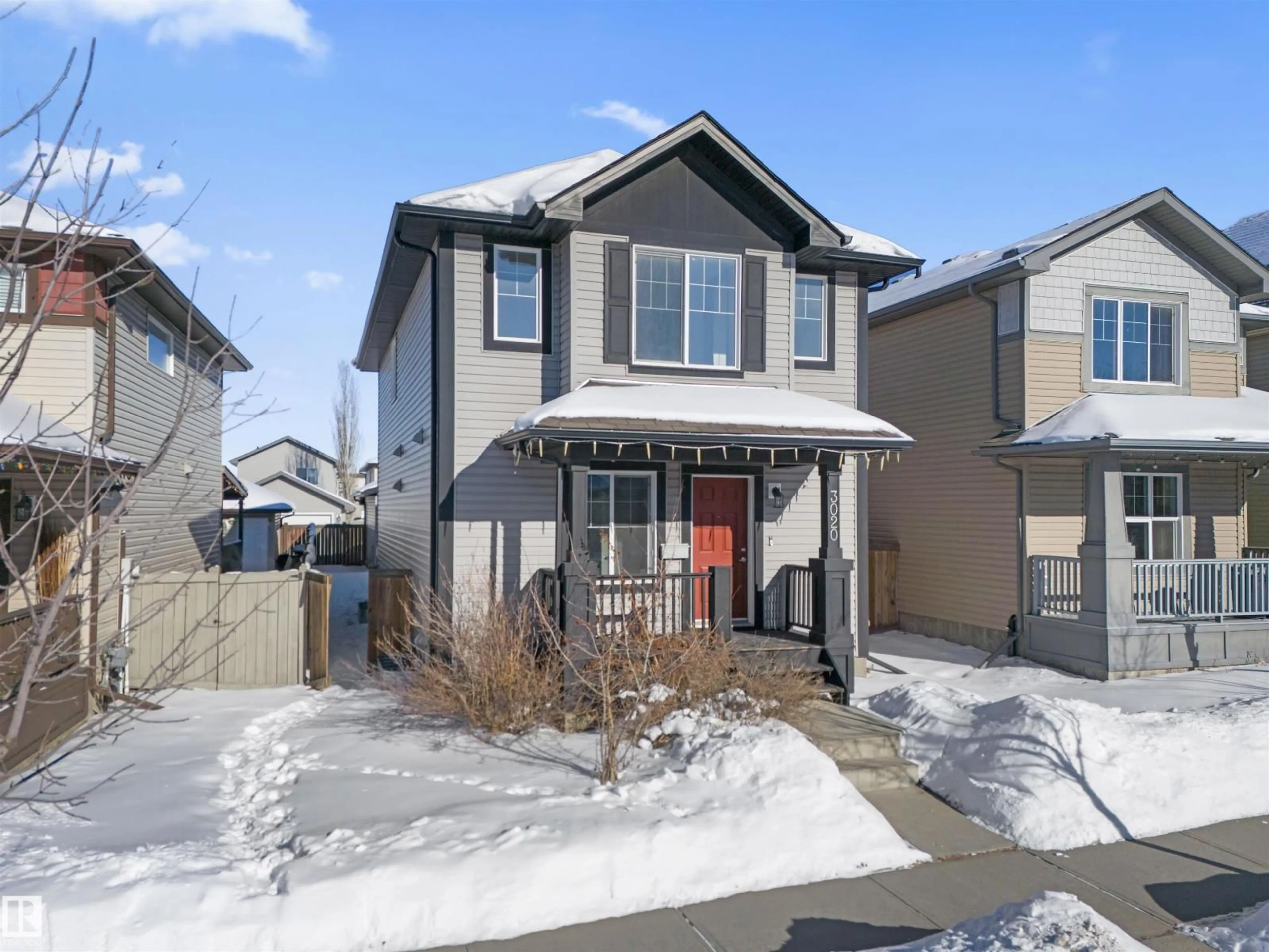 Home with vinyl exterior material, street for 3020 20 AV, Edmonton Alberta T6T0L8