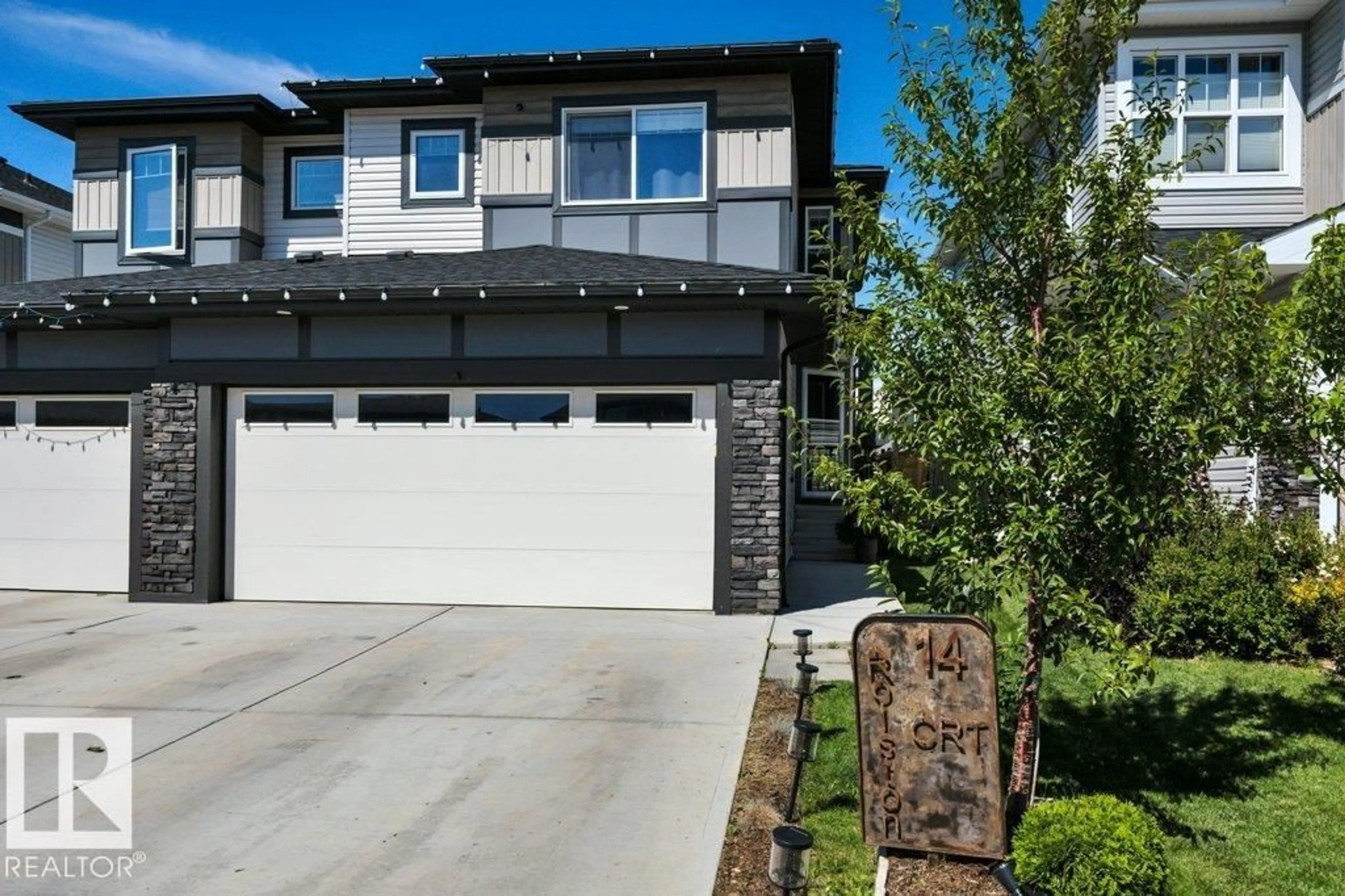 Home with vinyl exterior material, street for 14 ROLSTON CO, Leduc Alberta T9E1L1