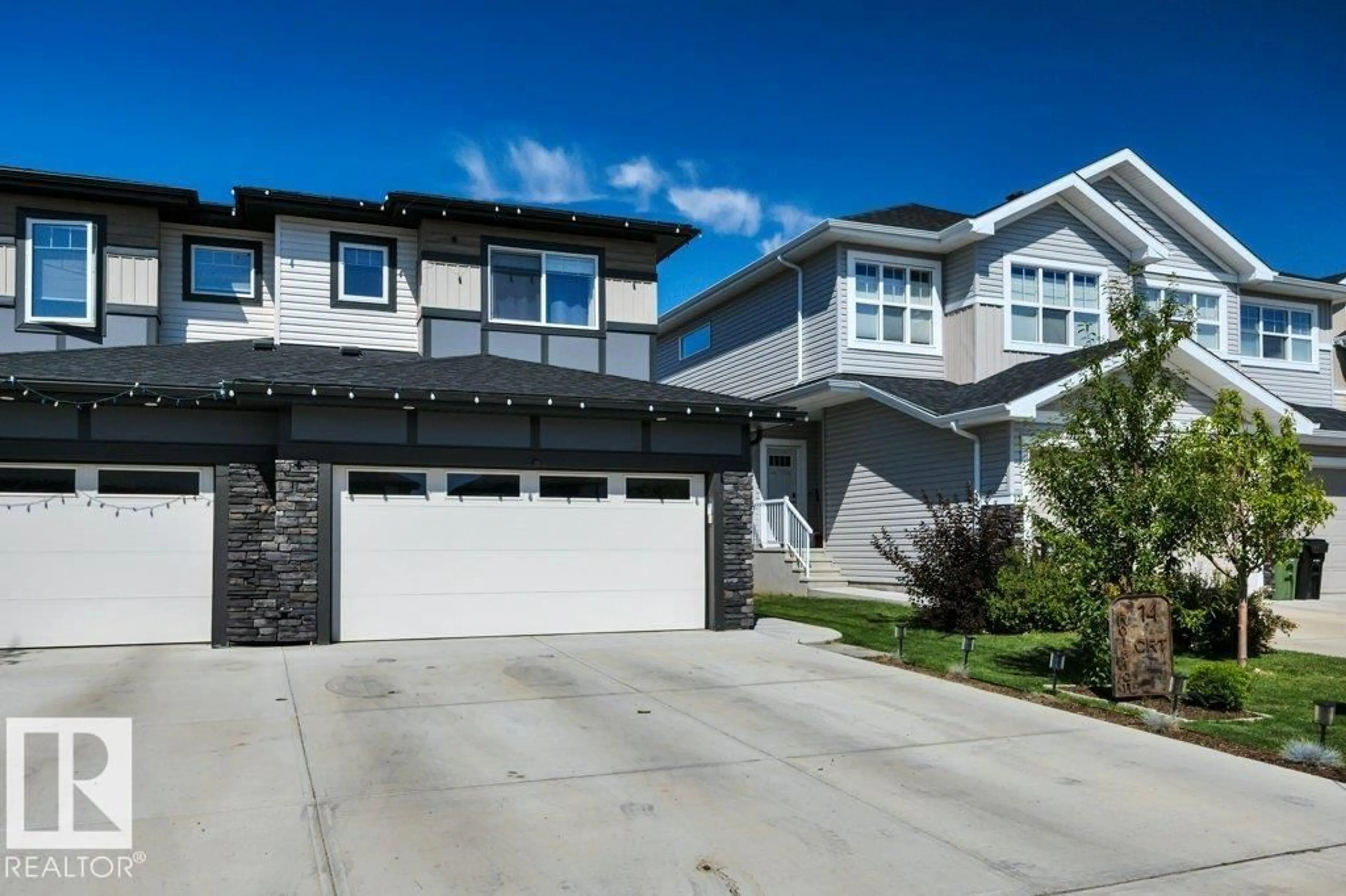 Home with vinyl exterior material, street for 14 ROLSTON CO, Leduc Alberta T9E1L1