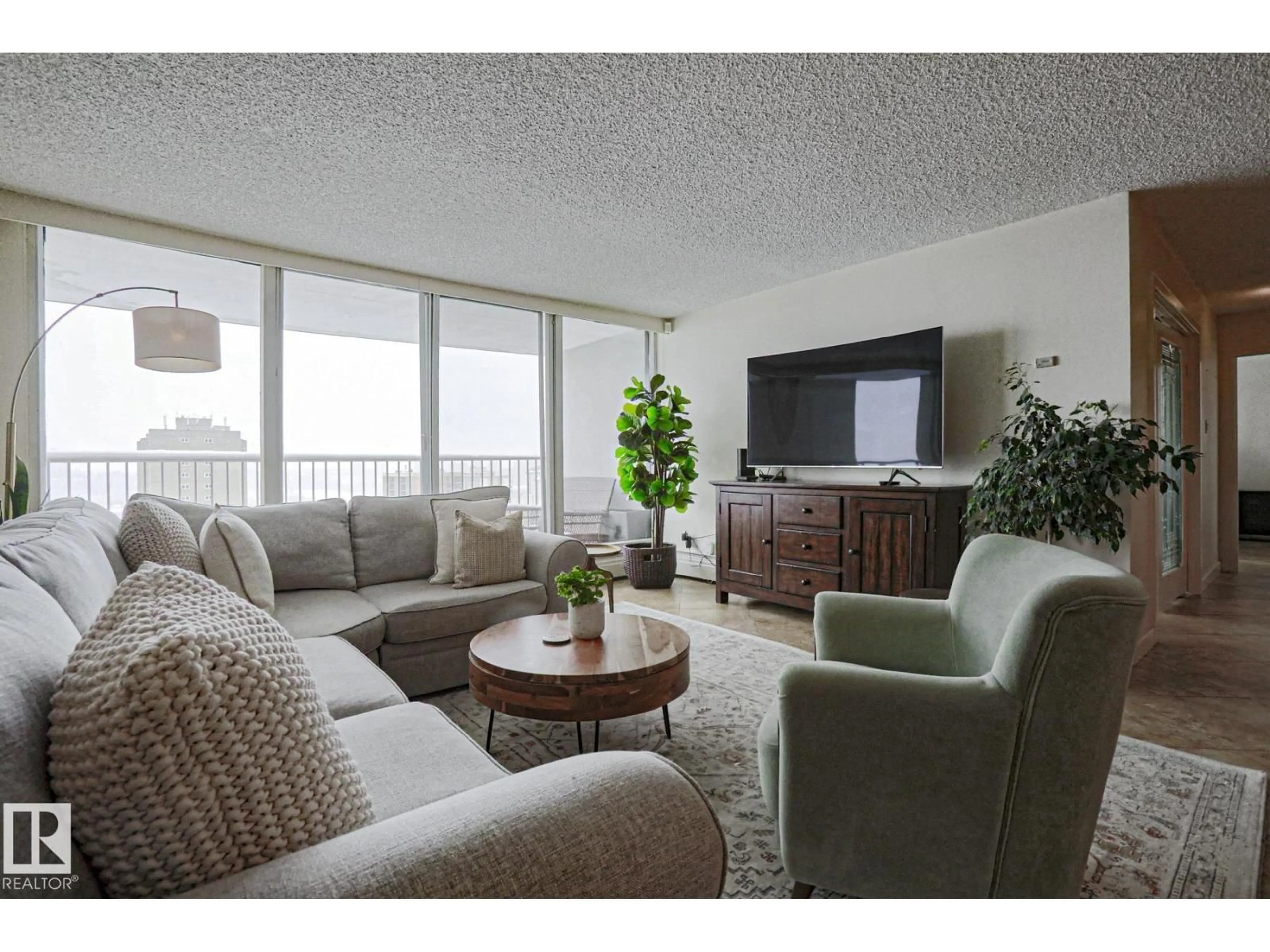 Living room with furniture, unknown for 9923 103 ST, Edmonton Alberta T5K2J3