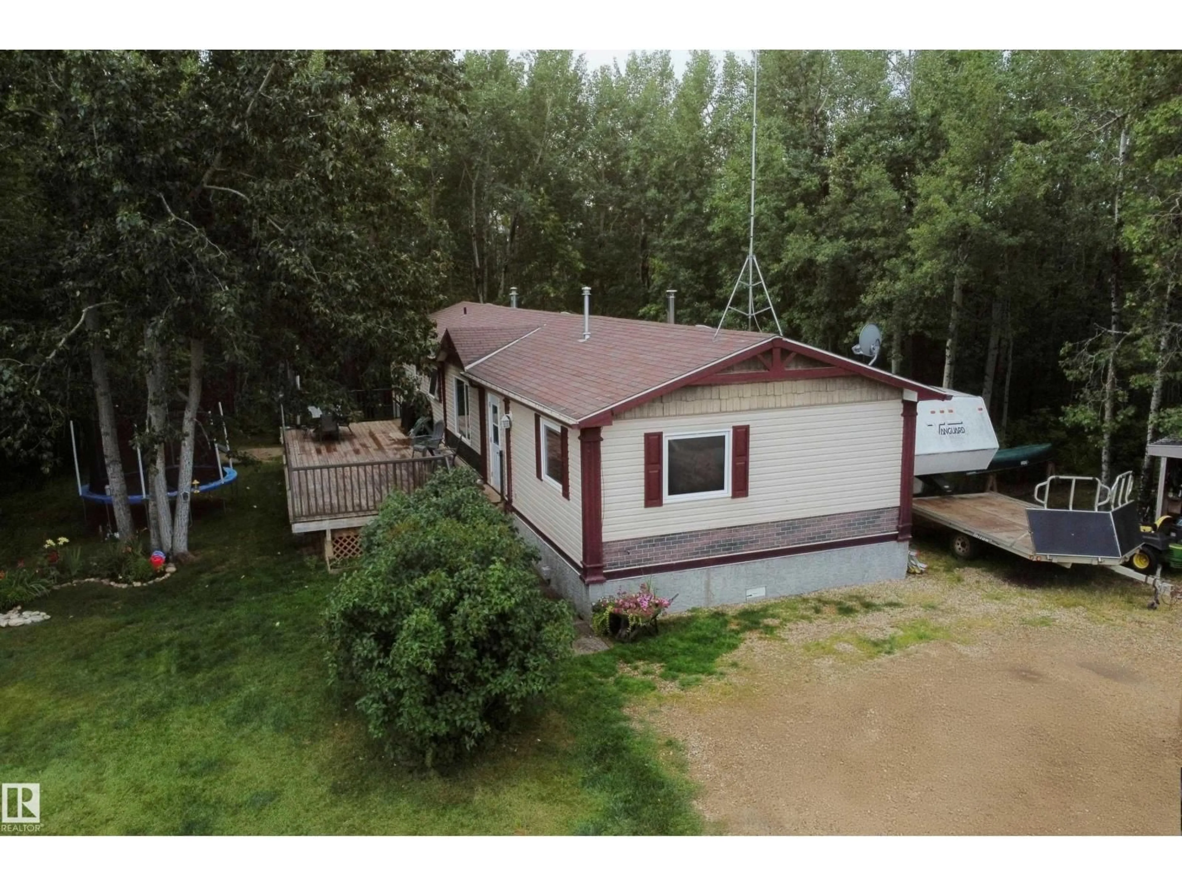 A pic from outside/outdoor area/front of a property/back of a property/a pic from drone, water/lake/river/ocean view for 60004 RGE RD 64, Rural Barrhead County Alberta T7N1N3