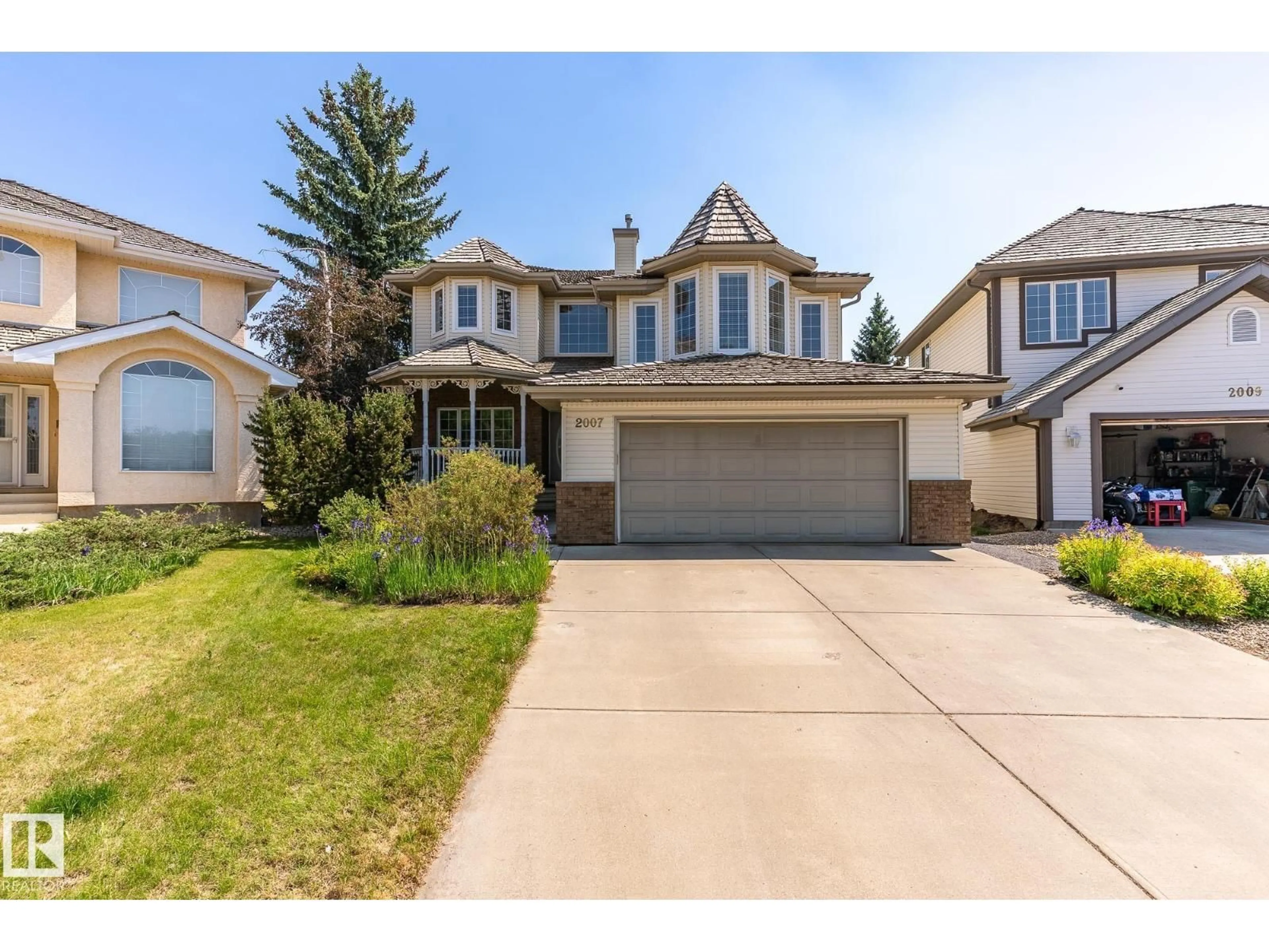 Home with vinyl exterior material, street for 2007 HADDOW DR, Edmonton Alberta T6R2P2