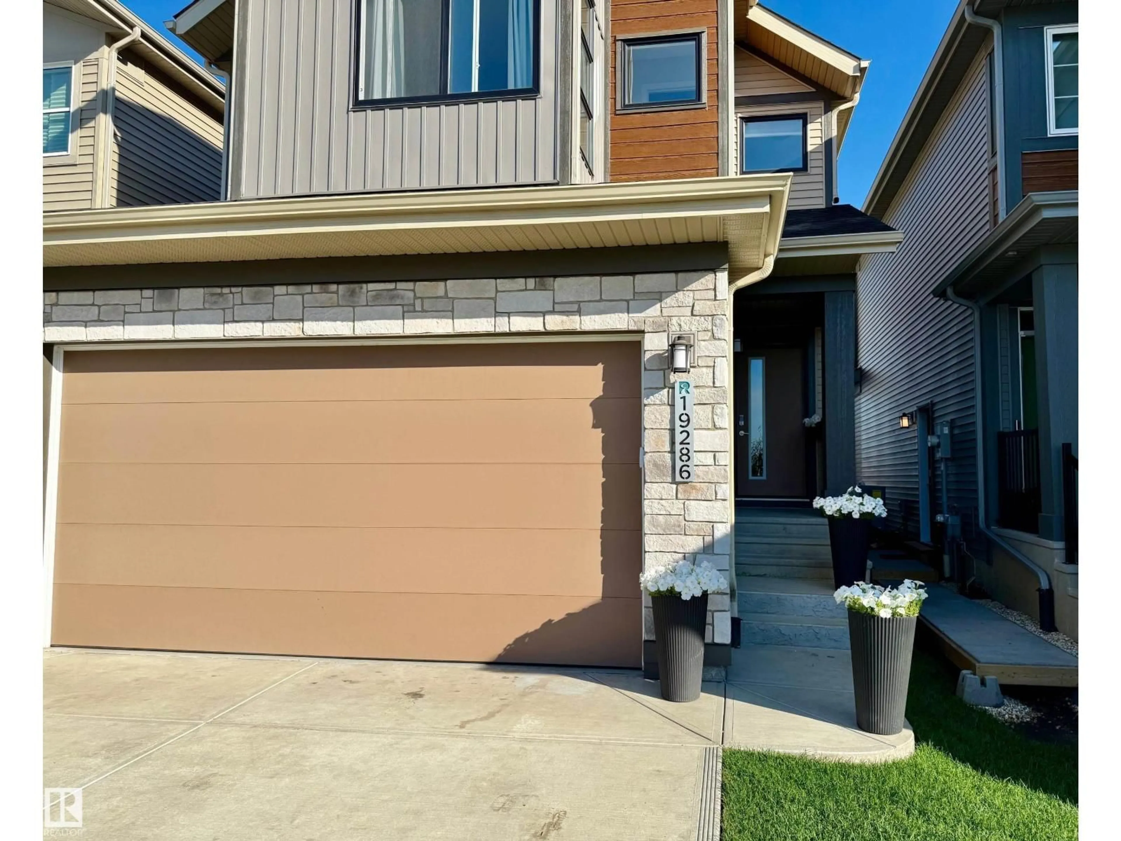Home with brick exterior material, street for 19286 22A AV, Edmonton Alberta T6M1P8