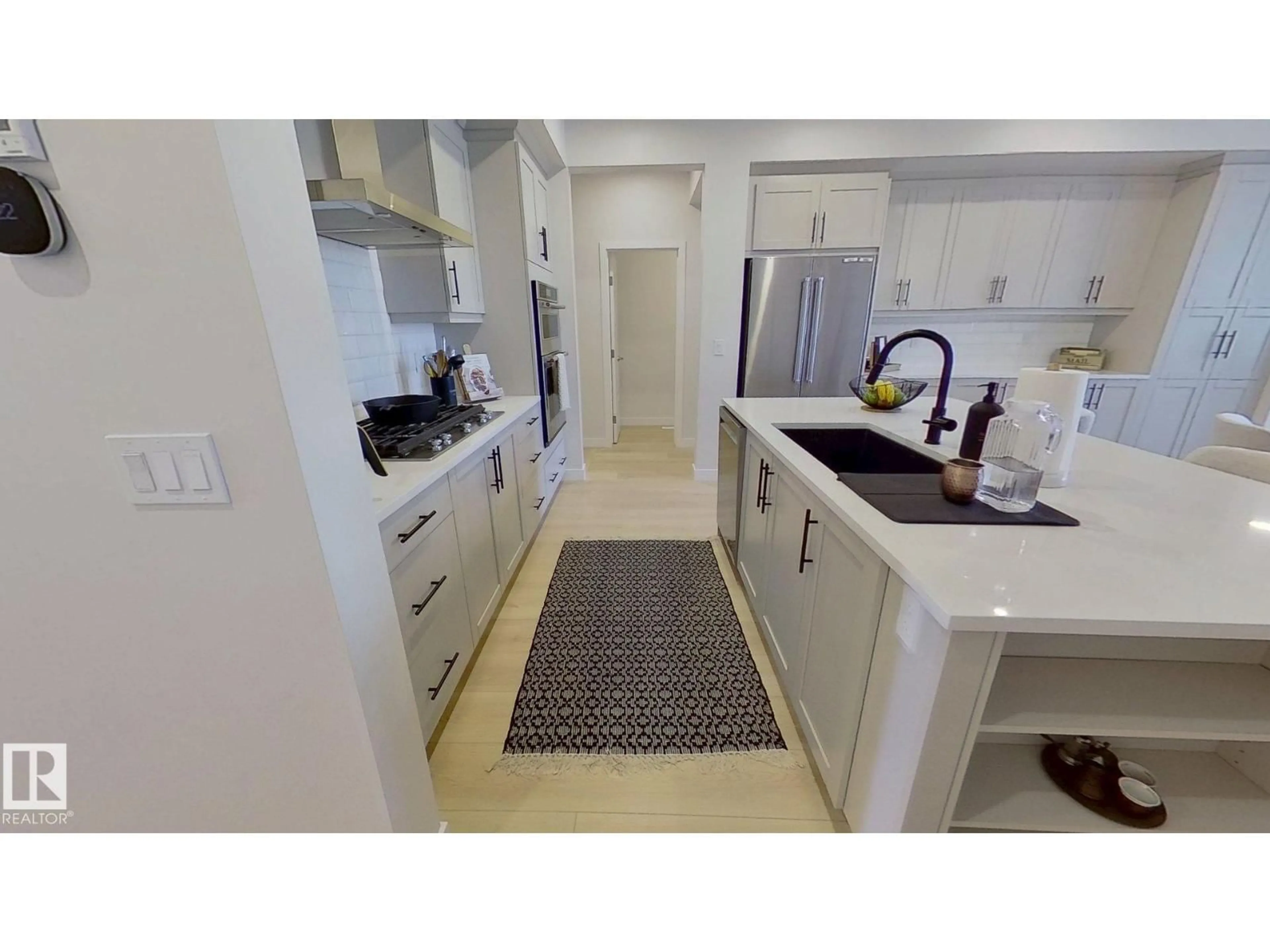 Open concept kitchen, ceramic/tile floor for 19286 22A AV, Edmonton Alberta T6M1P8