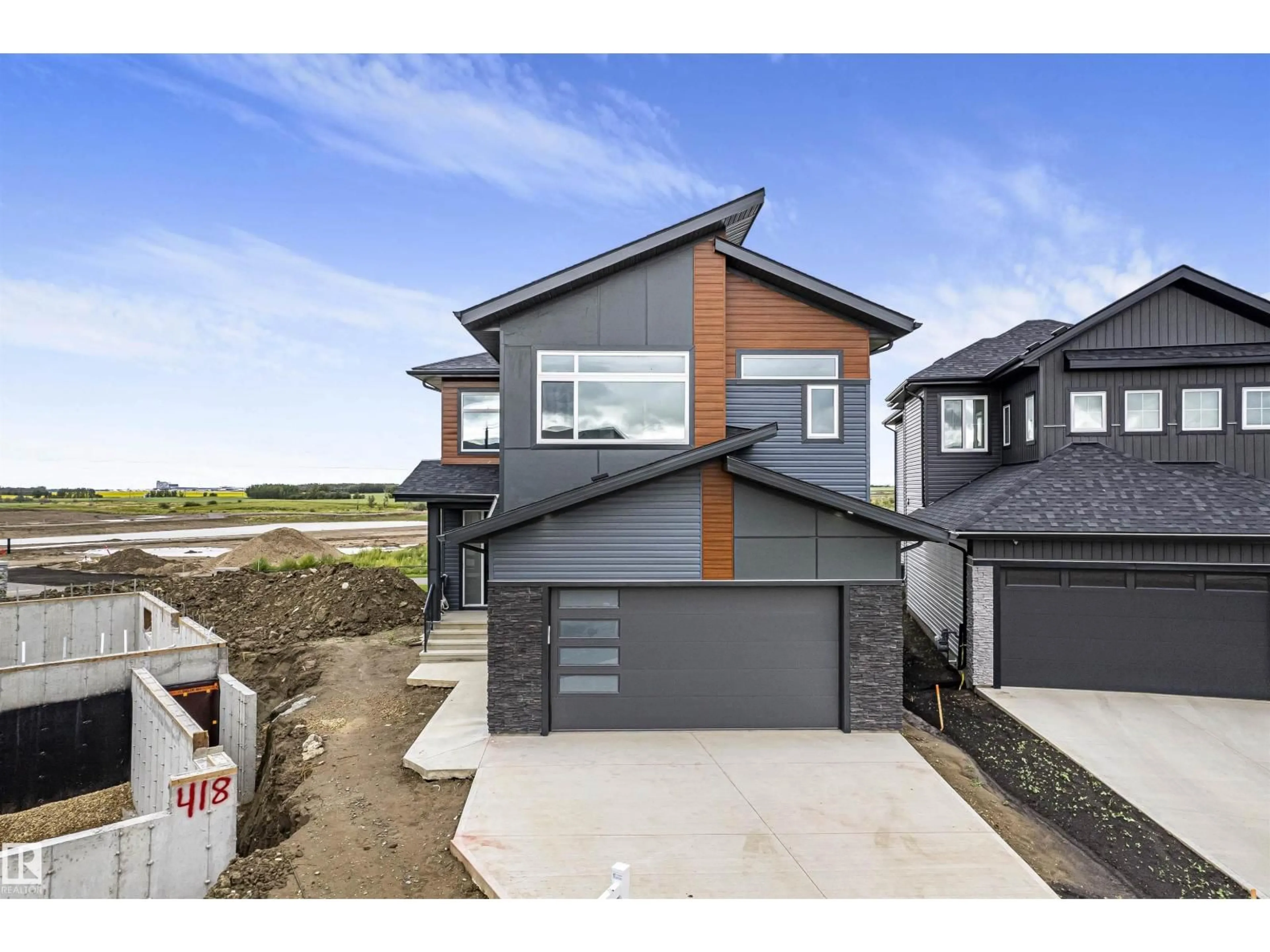 Home with brick exterior material, street for 416 PINE PT, Leduc Alberta T9E1S7