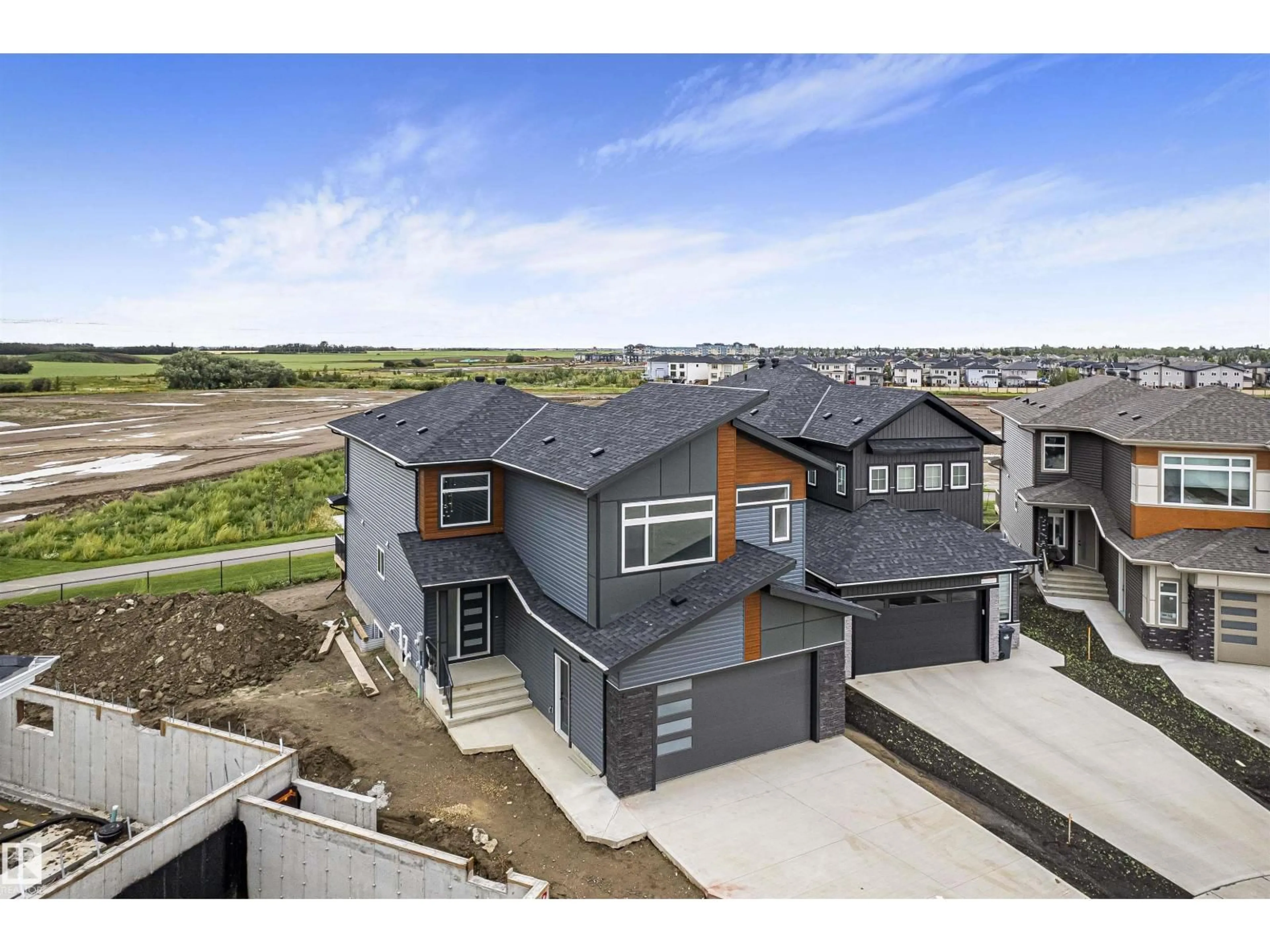 A pic from outside/outdoor area/front of a property/back of a property/a pic from drone, unknown for 416 PINE PT, Leduc Alberta T9E1S7