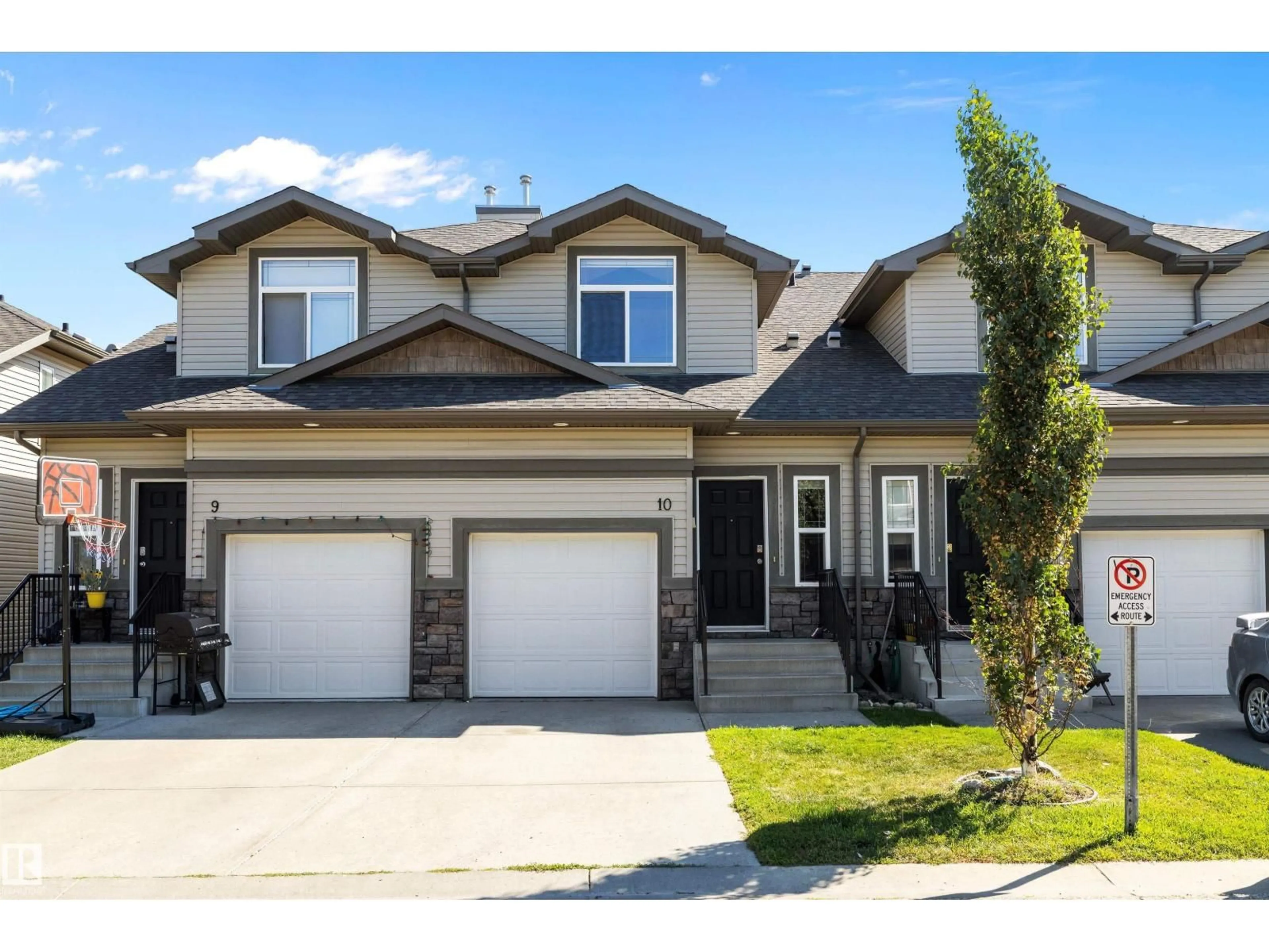 Home with vinyl exterior material, street for #10 - 9511 102 AV, Morinville Alberta T8R0C6