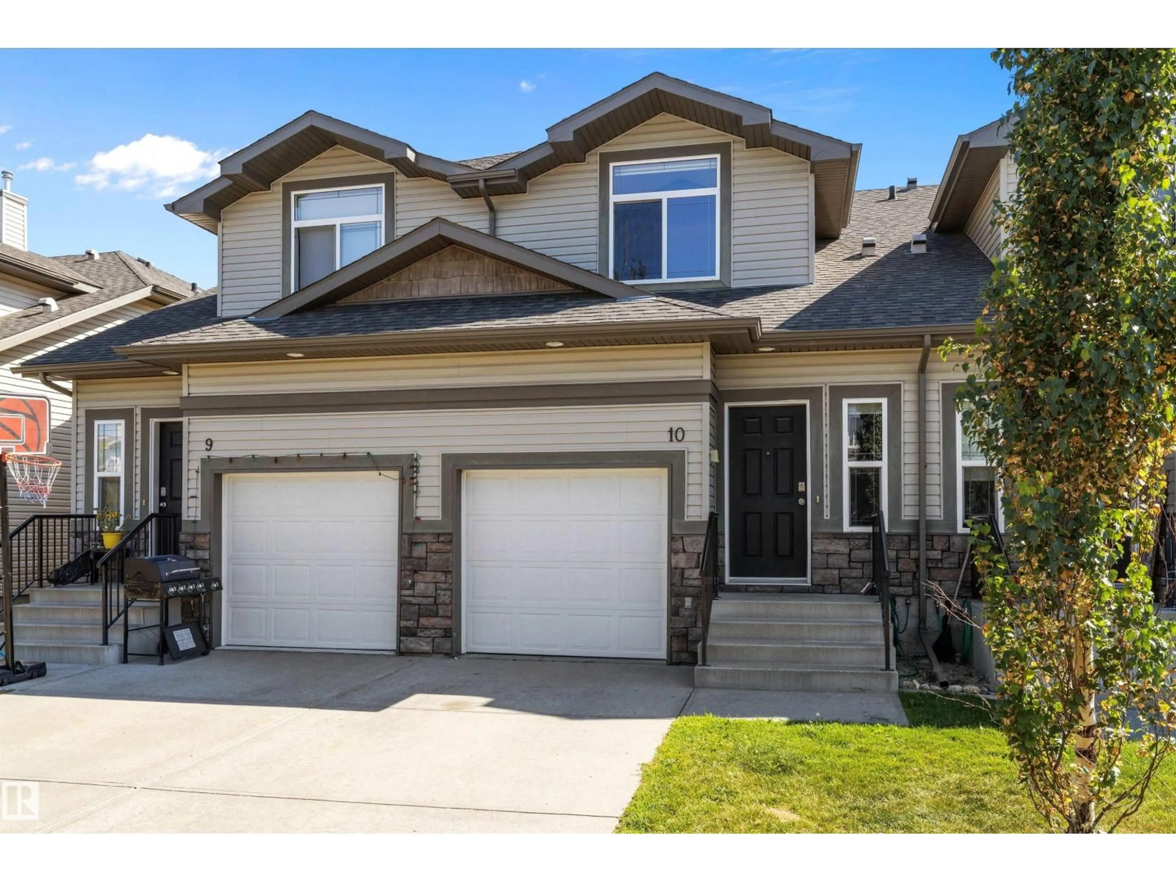Home with vinyl exterior material, street for #10 - 9511 102 AV, Morinville Alberta T8R0C6