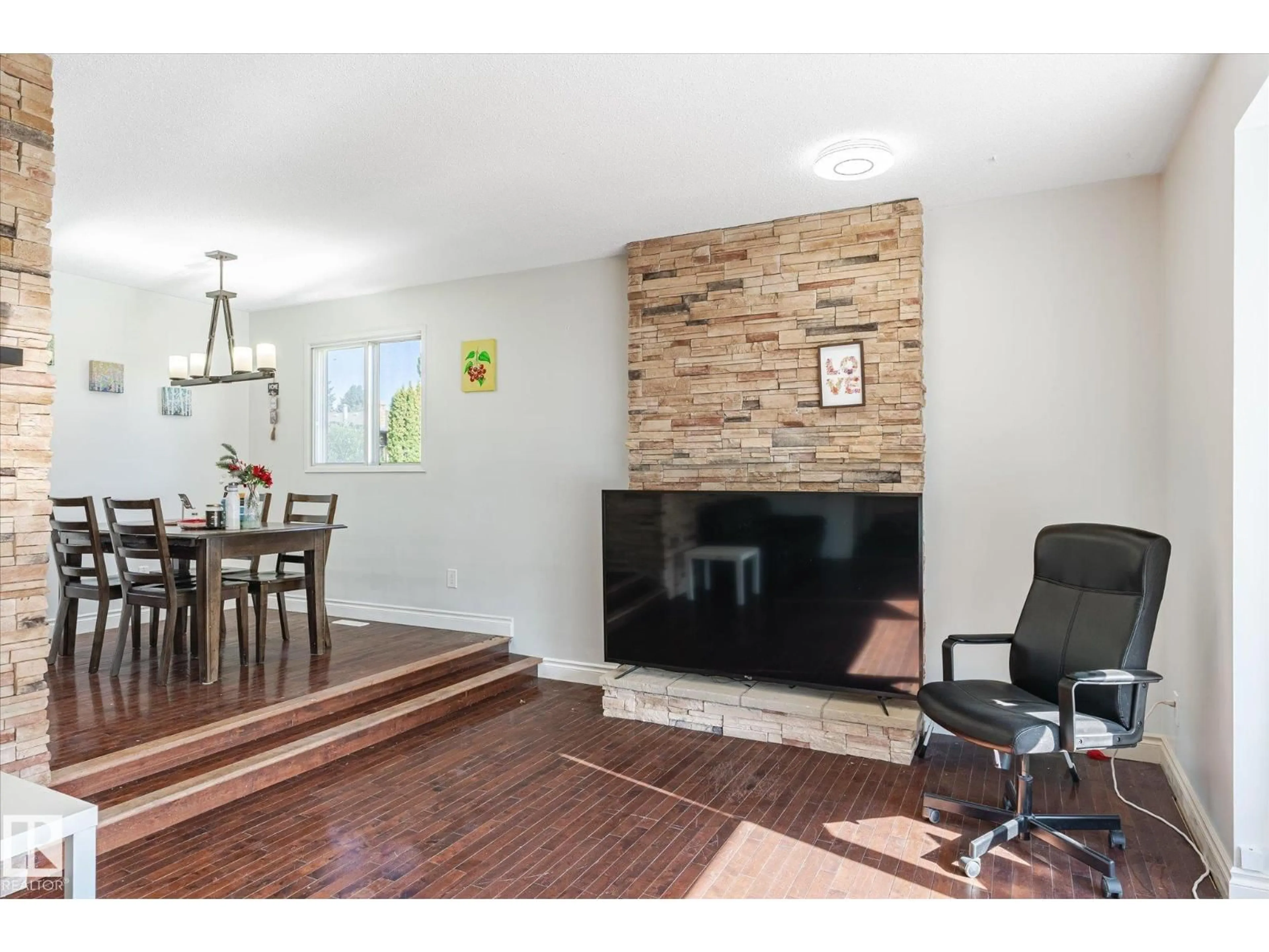 Living room with furniture, ceramic/tile floor for NW - 2520 116 ST, Edmonton Alberta T6J3S2