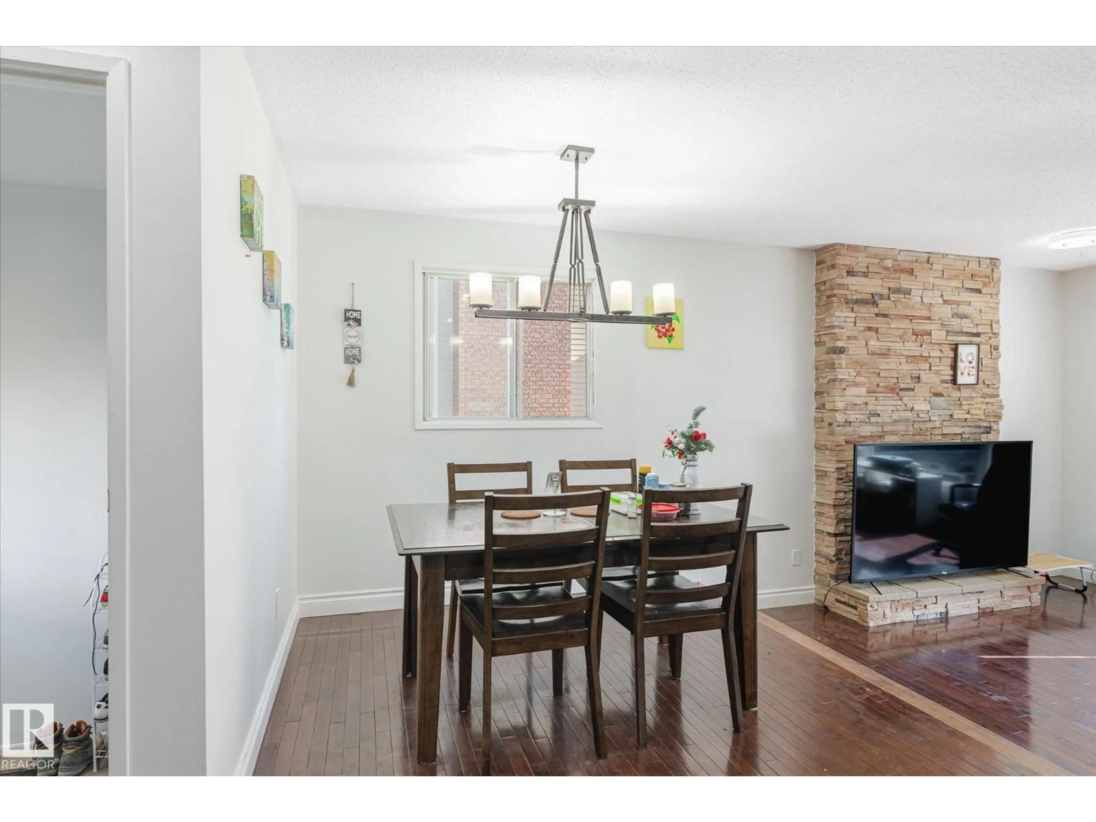 Dining room, wood/laminate floor for NW - 2520 116 ST, Edmonton Alberta T6J3S2