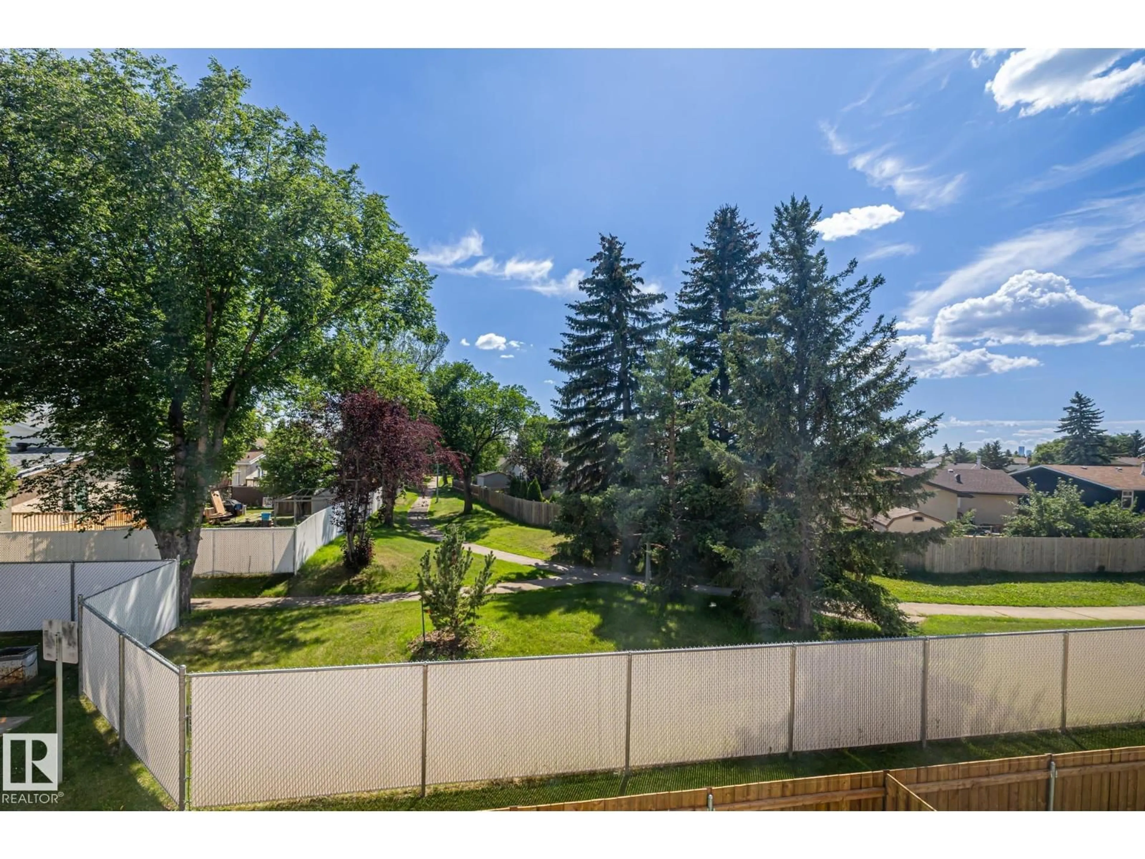 A pic from outside/outdoor area/front of a property/back of a property/a pic from drone, mountain view for 2B CLAREVIEW VG, Edmonton Alberta T5A3P2