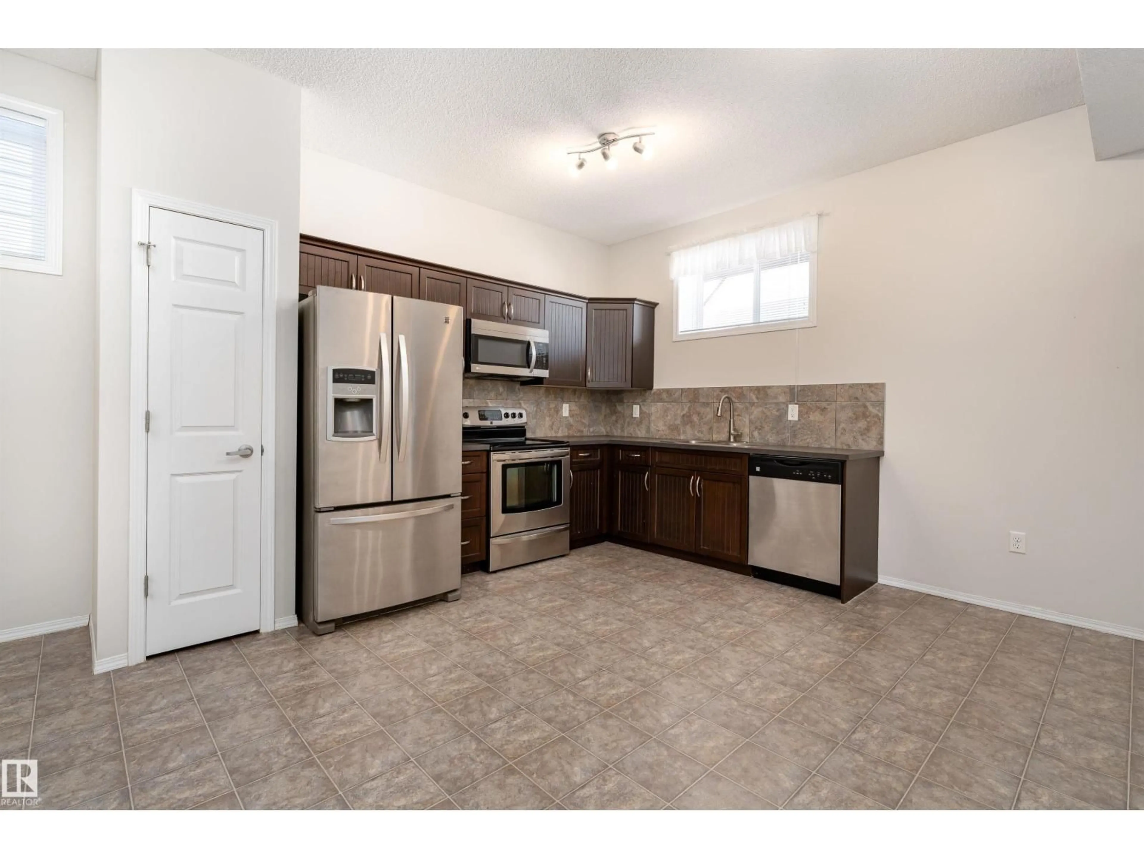 Standard kitchen, ceramic/tile floor for 142 - 140 SELKIRK PL, Leduc Alberta T9E0M9