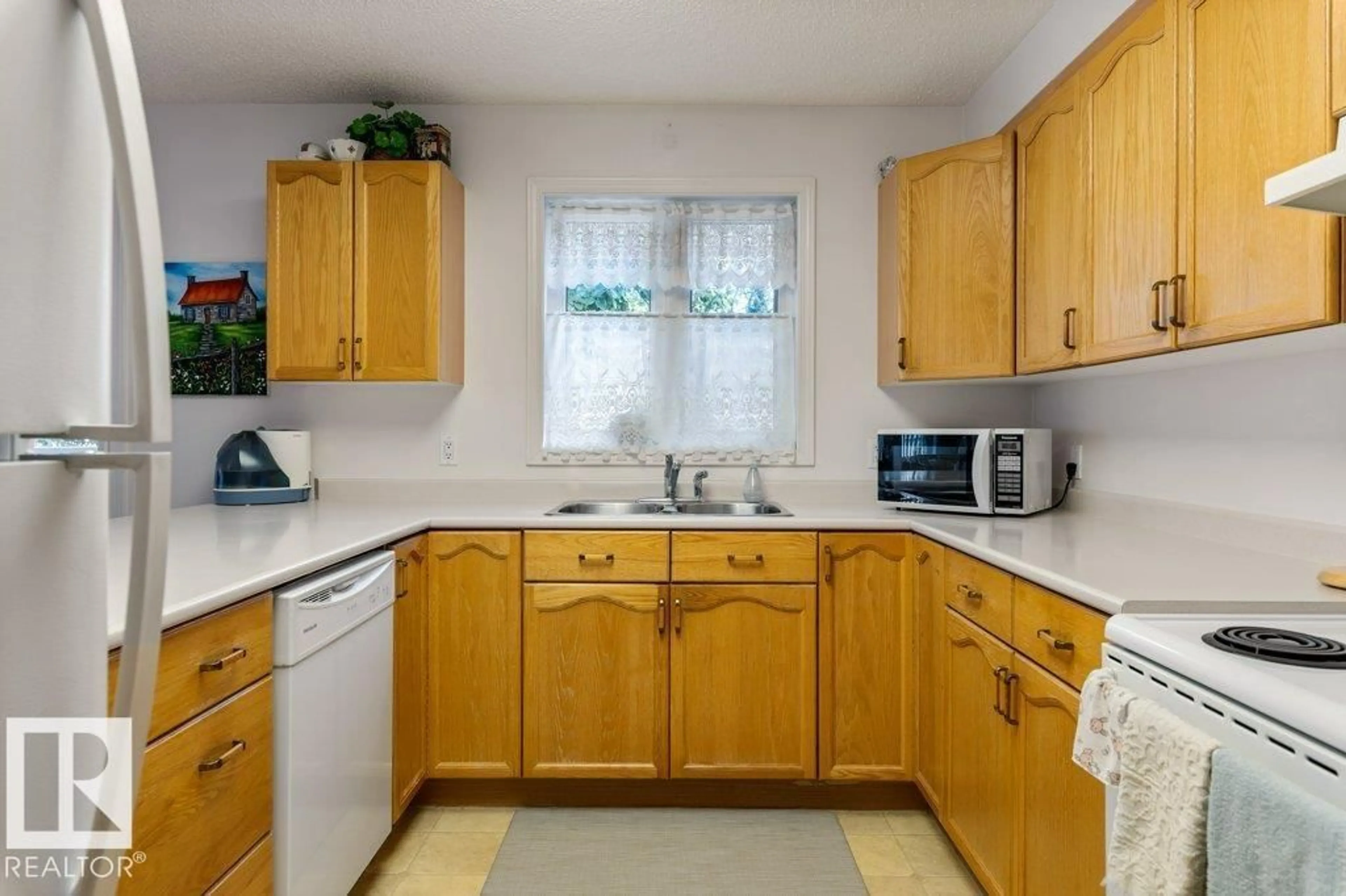Standard kitchen, ceramic/tile floor for #106 - 160 KINGSWOOD BV, St. Albert Alberta T8N6V4