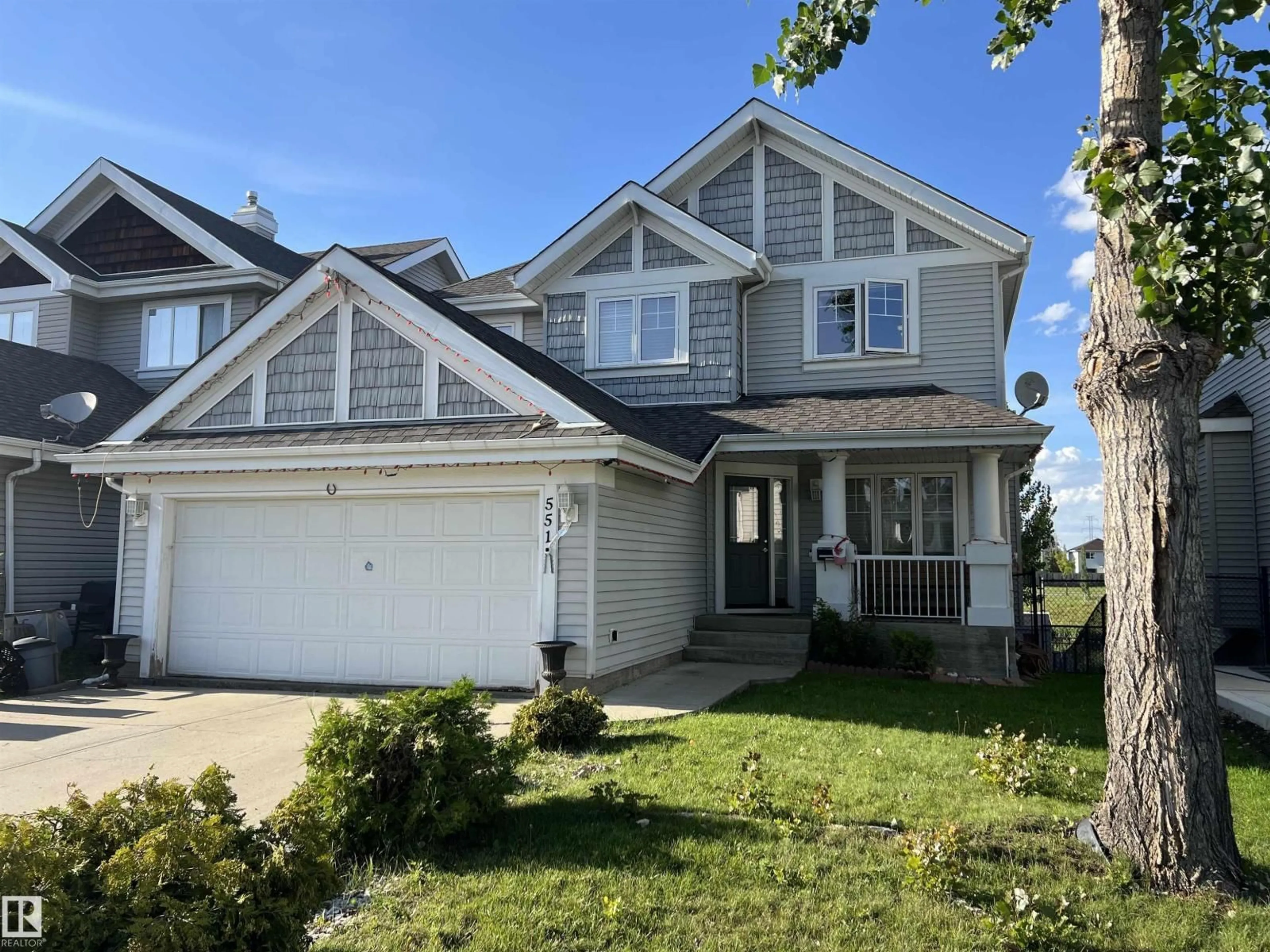 Home with vinyl exterior material, street for 551 STEWART CR, Edmonton Alberta T6X0A8