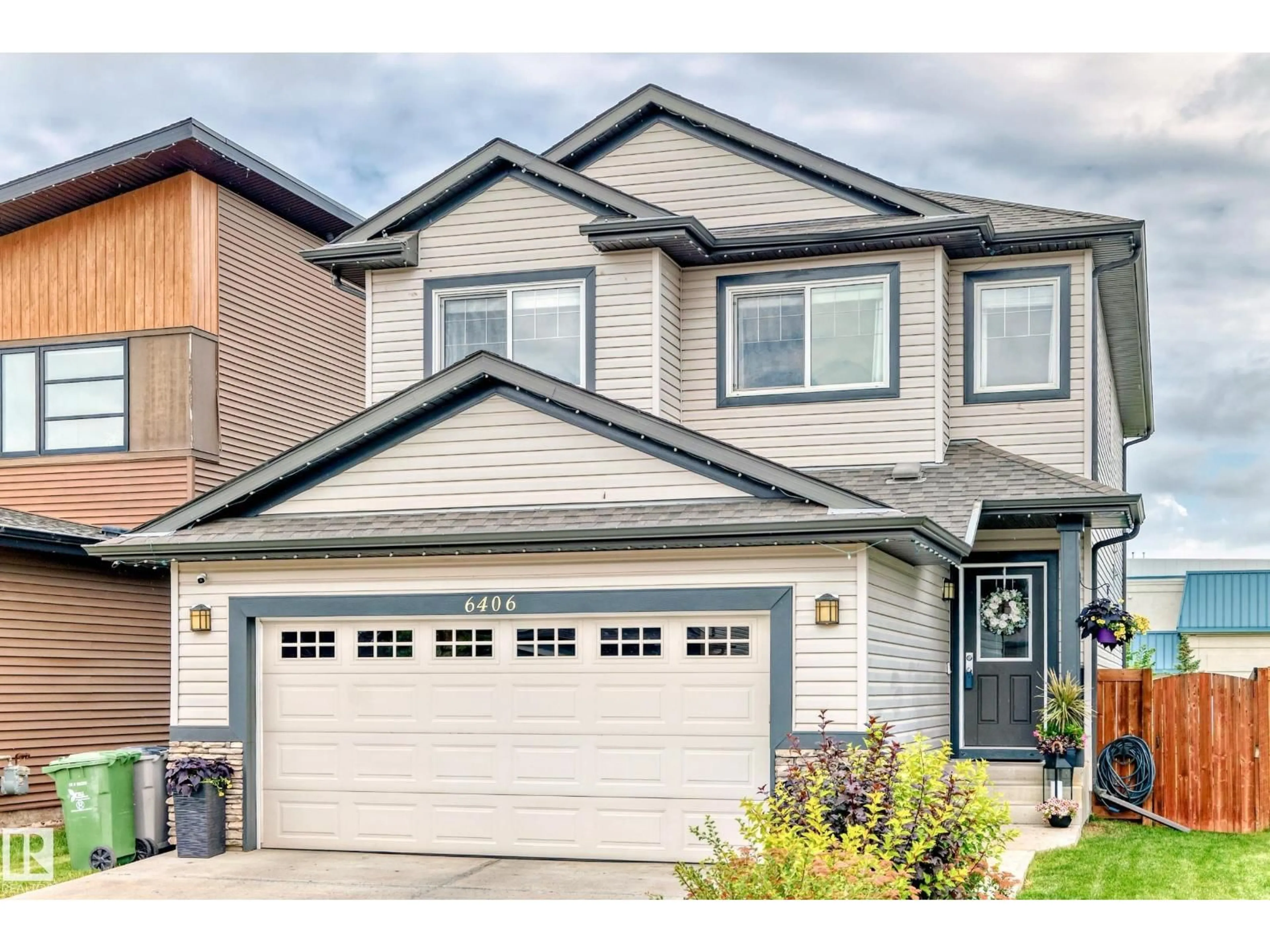 Home with vinyl exterior material, street for 6406 49 AV, Beaumont Alberta T4X0W5