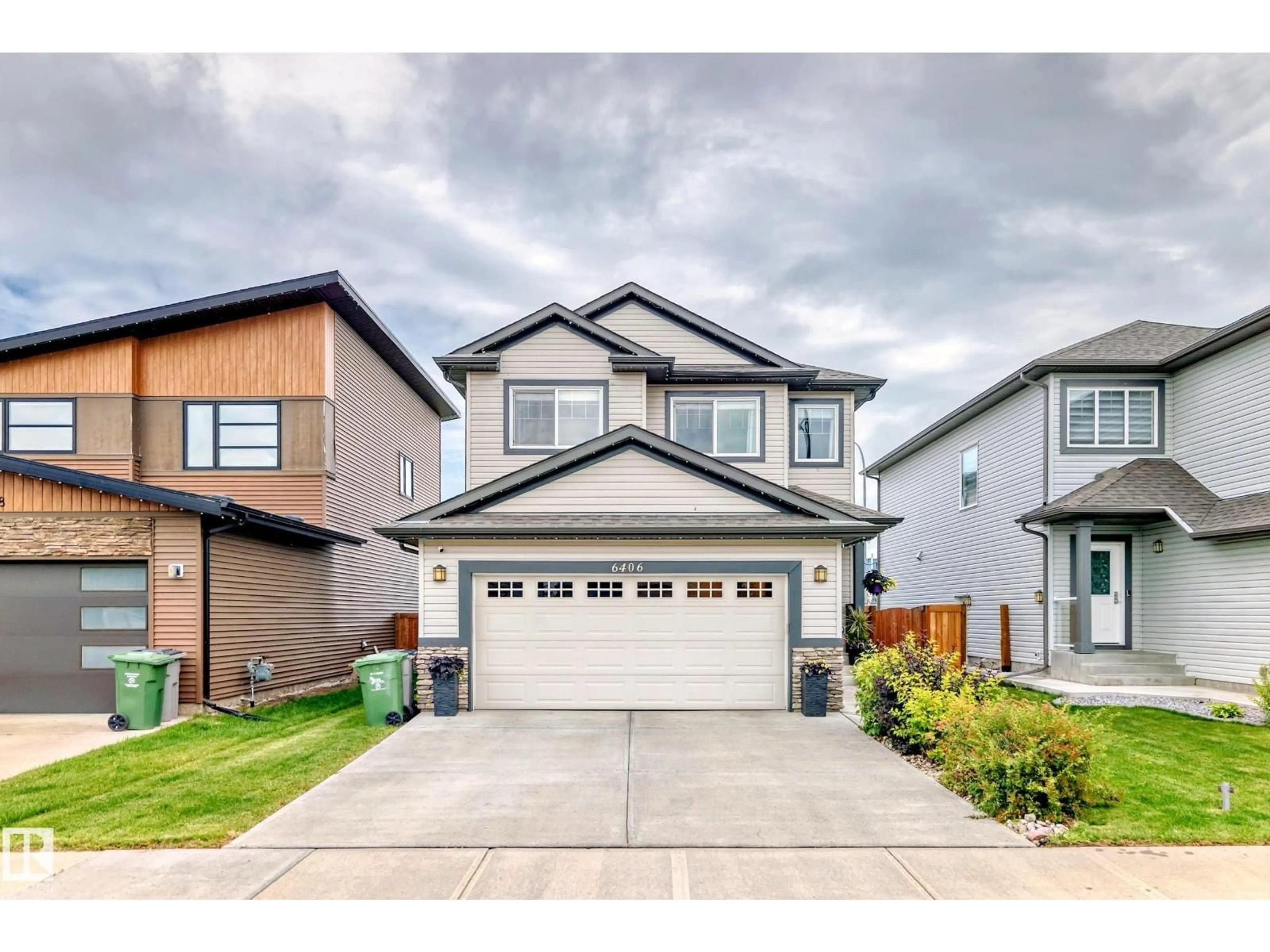 Home with vinyl exterior material, street for 6406 49 AV, Beaumont Alberta T4X0W5