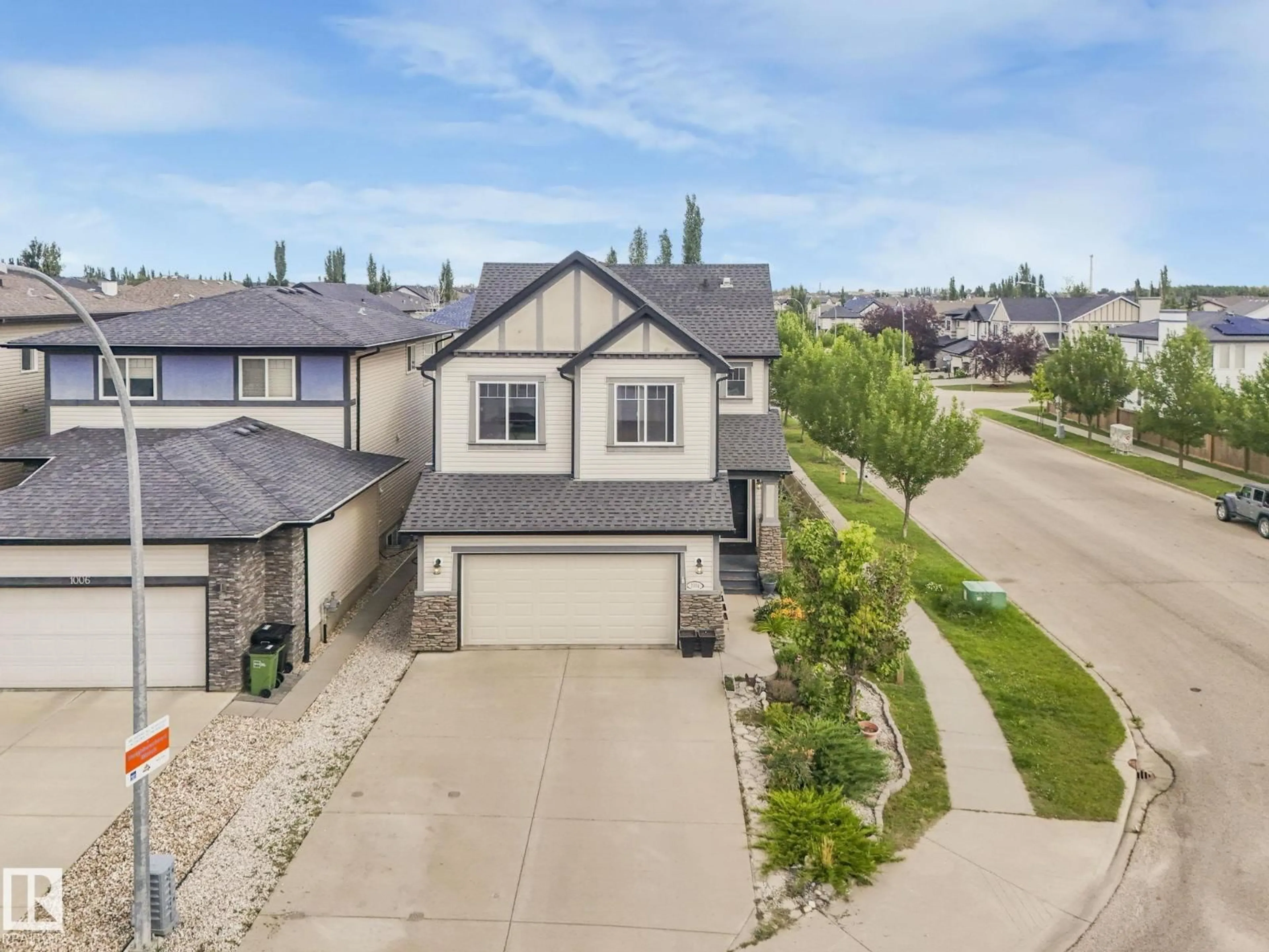 A pic from outside/outdoor area/front of a property/back of a property/a pic from drone, street for NW - 1004 SECORD PM, Edmonton Alberta T5T4A4